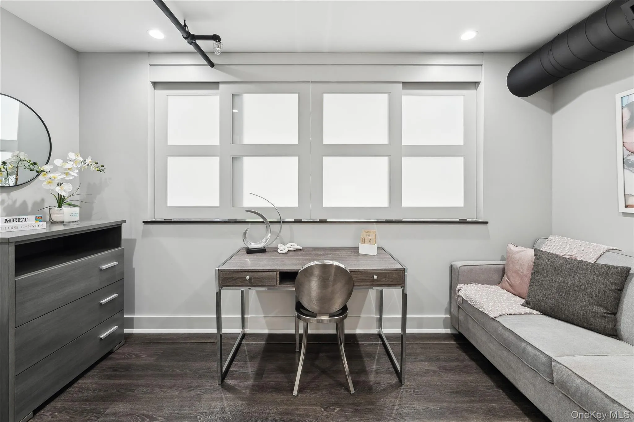 Office space featuring dark wood-style flooring and recessed lighting Office space featuring dark wood-style flooring and recessed lighting