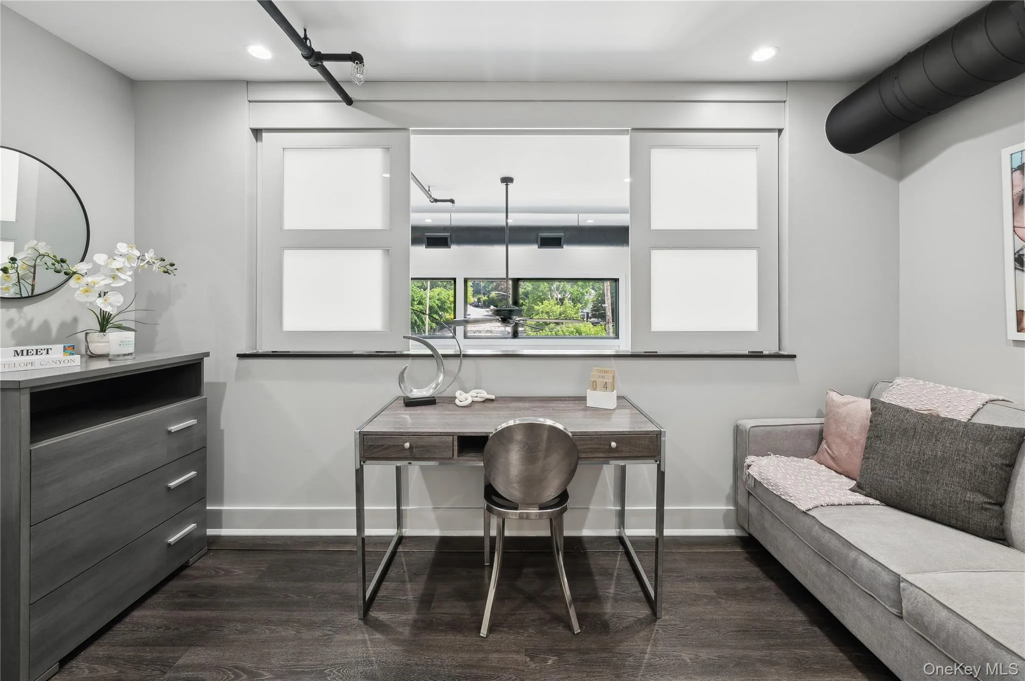 Home office featuring dark wood-style flooring and recessed lighting Home office featuring dark wood-style flooring and recessed lighting