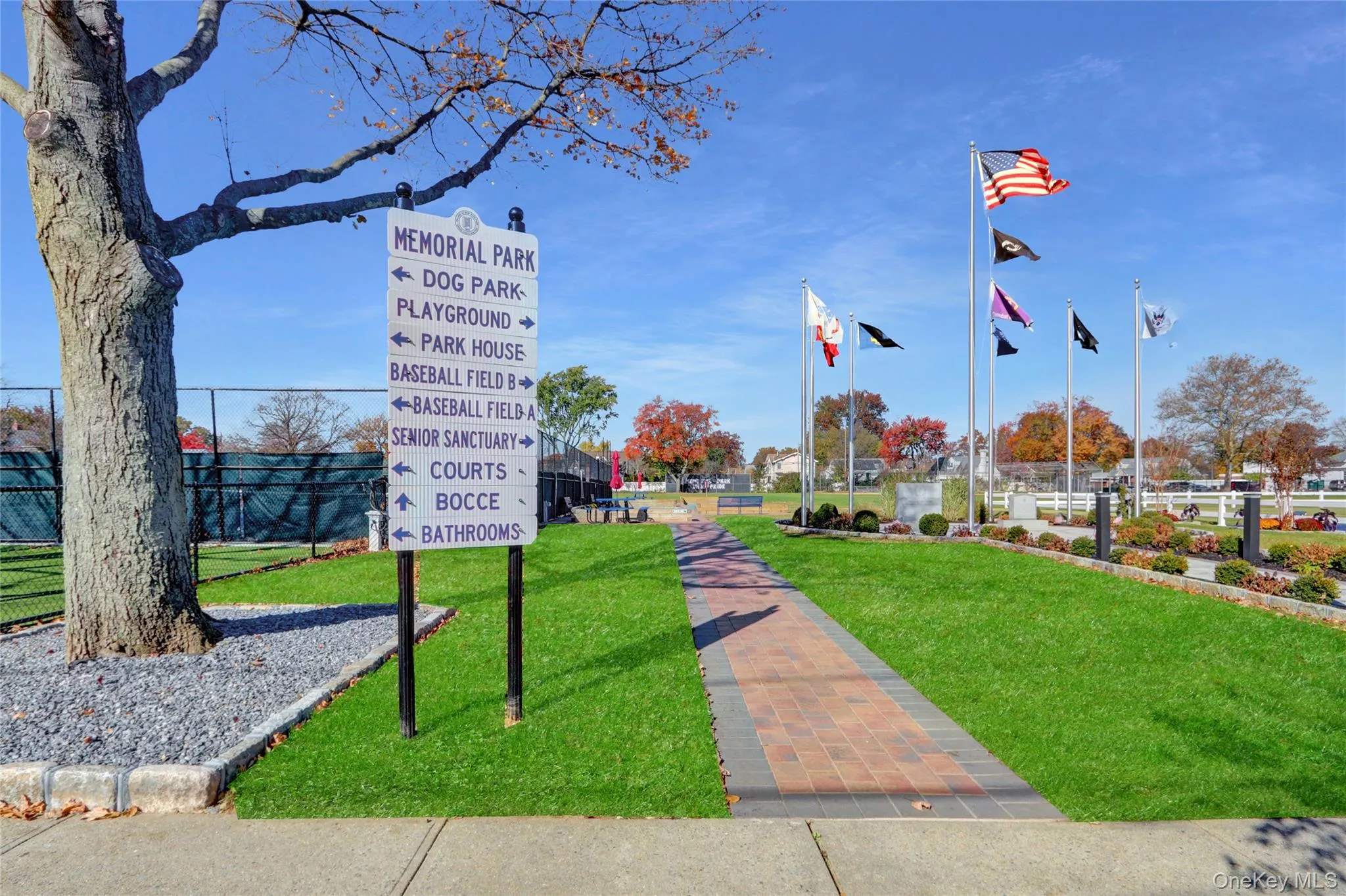 View of home's community with a yard View of home's community with a yard