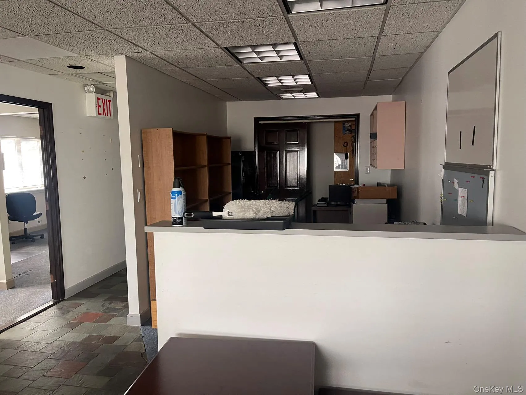 Kitchen with a paneled ceiling and a peninsula Kitchen with a paneled ceiling and a peninsula