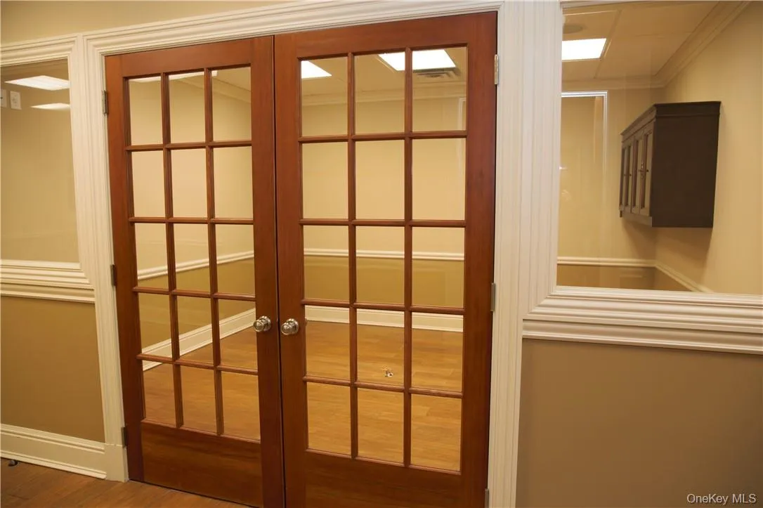French doors on the conference room for privacy and noise reduction, inside and out. French doors on the conference room for privacy and noise reduction, inside and out.