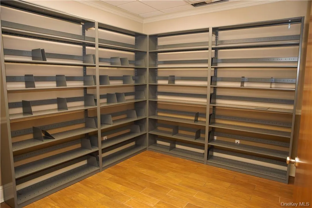 Office #2. Shelving will be removed. Office #2. Shelving will be removed.