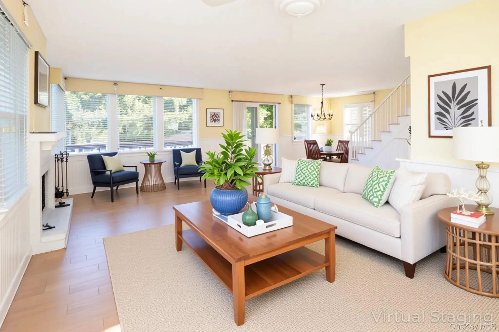 Virtually Staged Living area featuring light wood-style floors and a chandelier Virtually Staged Living area featuring light wood-style floors and a chandelier