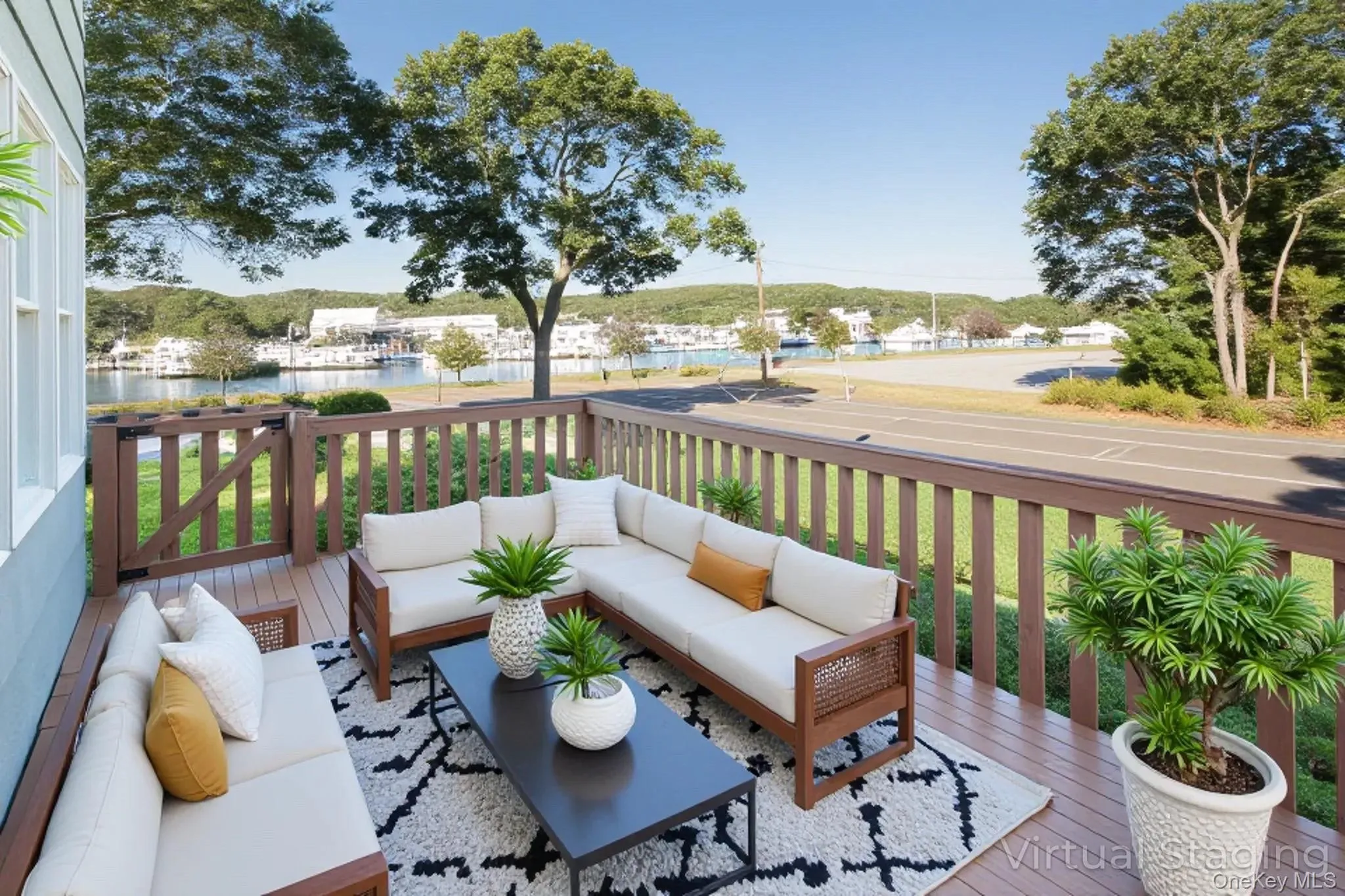 Virtually Staged Deck featuring an outdoor hangout area and a water view Virtually Staged Deck featuring an outdoor hangout area and a water view