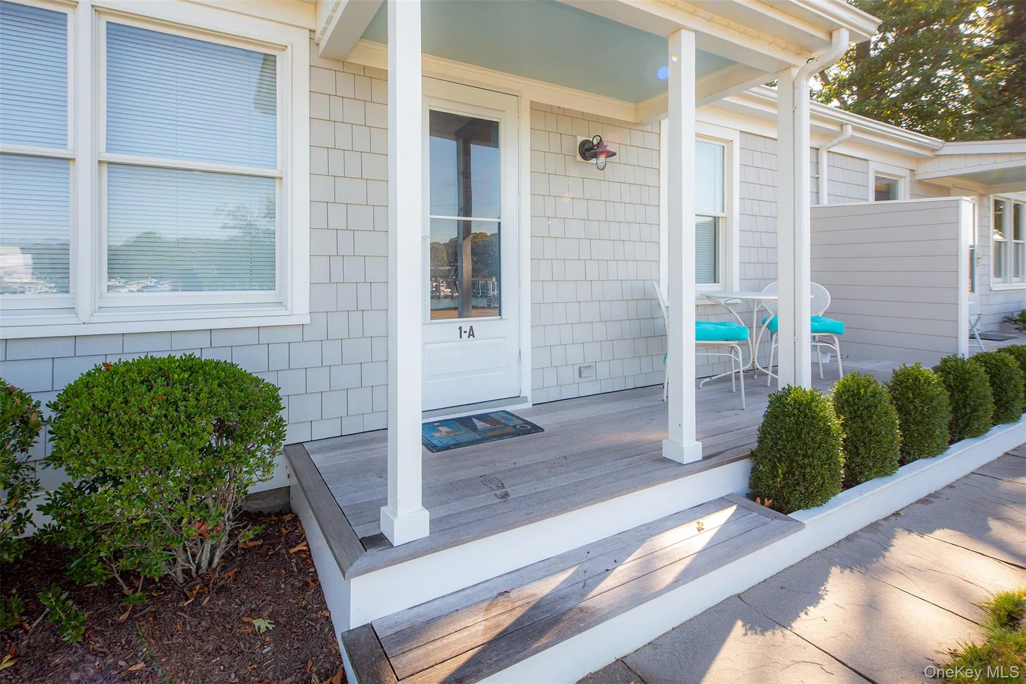 Doorway to property featuring covered porch Doorway to property featuring covered porch