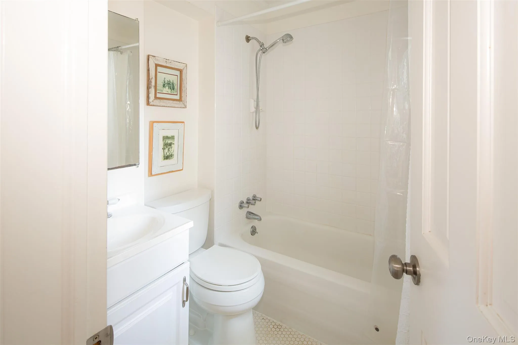 Full bath with vanity and shower / tub combo with curtain Full bath with vanity and shower / tub combo with curtain