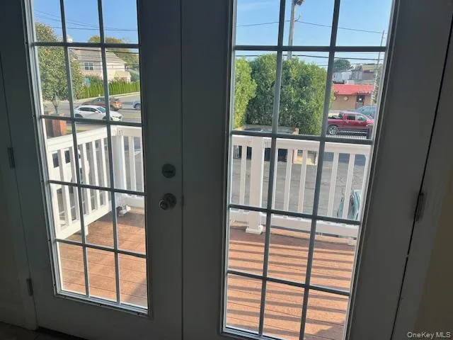 Doorway to outside featuring french doors Doorway to outside featuring french doors