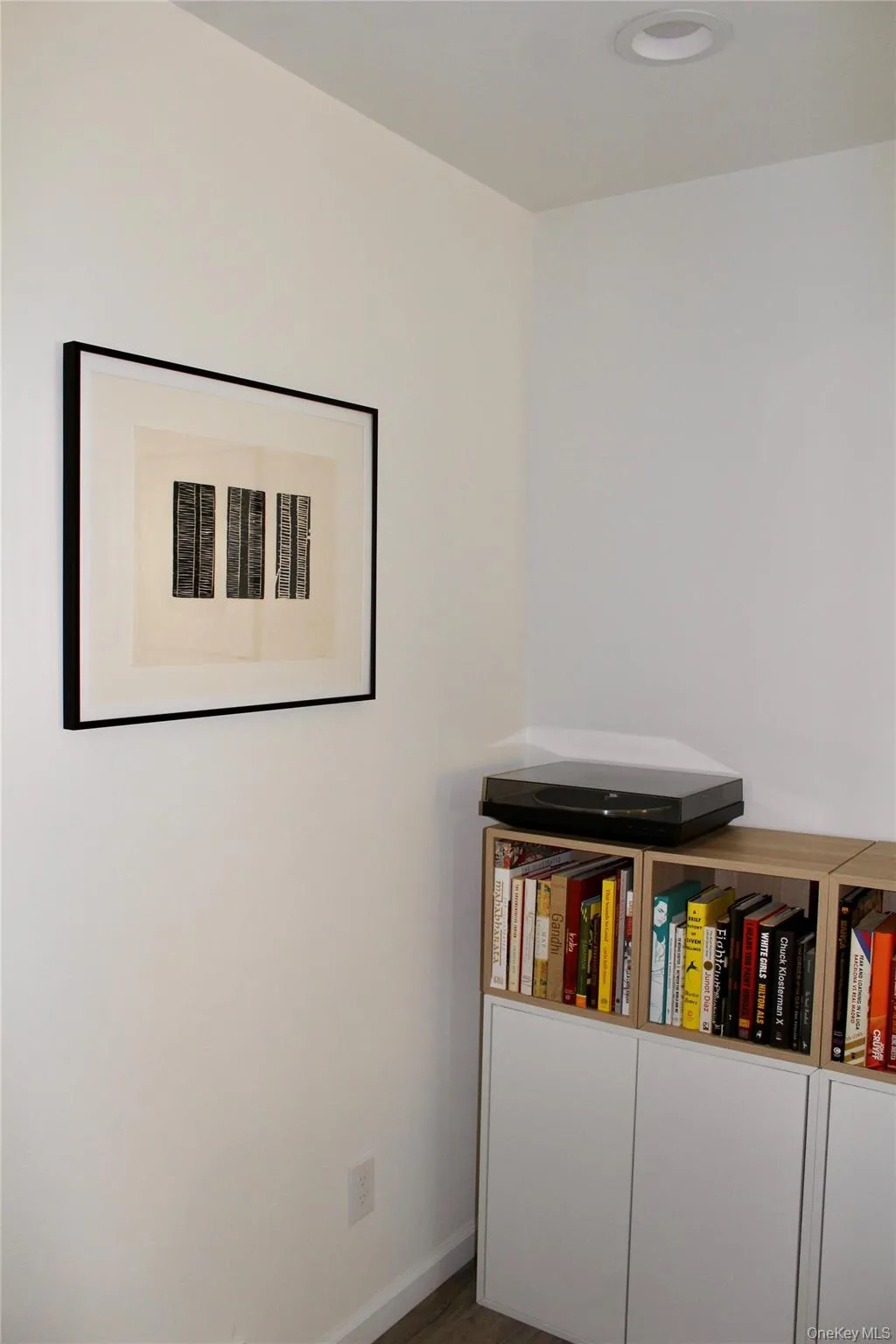 Detailed view of baseboards and wood finished floors Detailed view of baseboards and wood finished floors