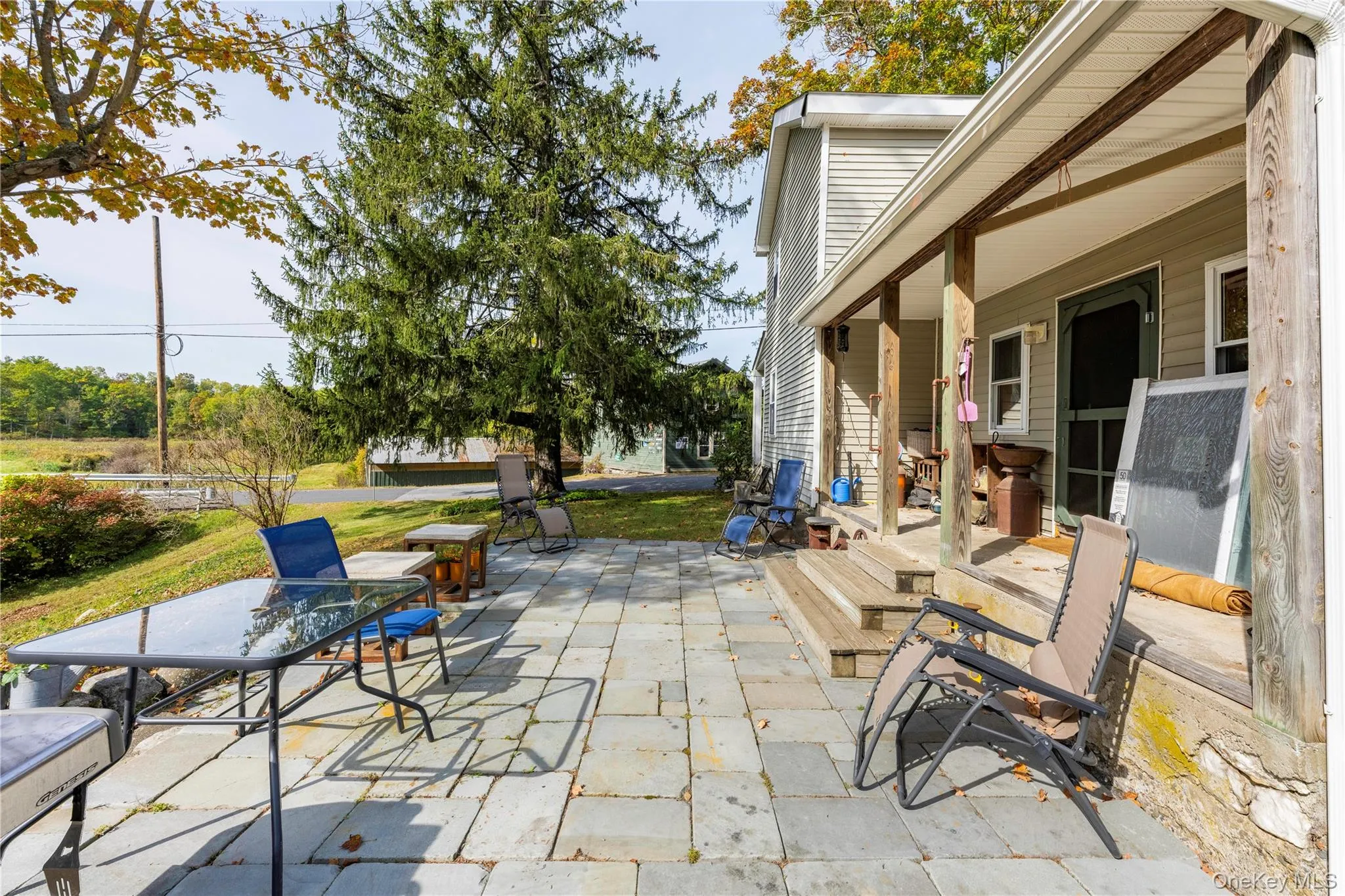 View of patio / terrace featuring outdoor dining area View of patio / terrace featuring outdoor dining area