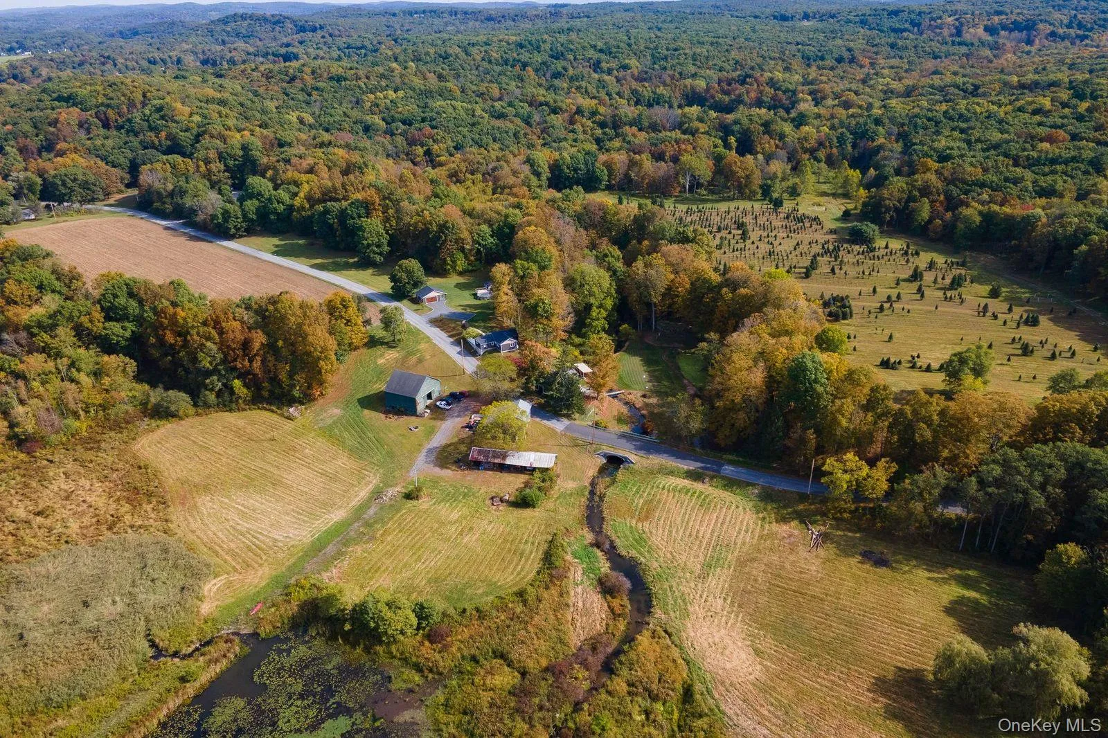 Aerial view of property and surrounding area featuring rural landscape Aerial view of property and surrounding area featuring rural landscape