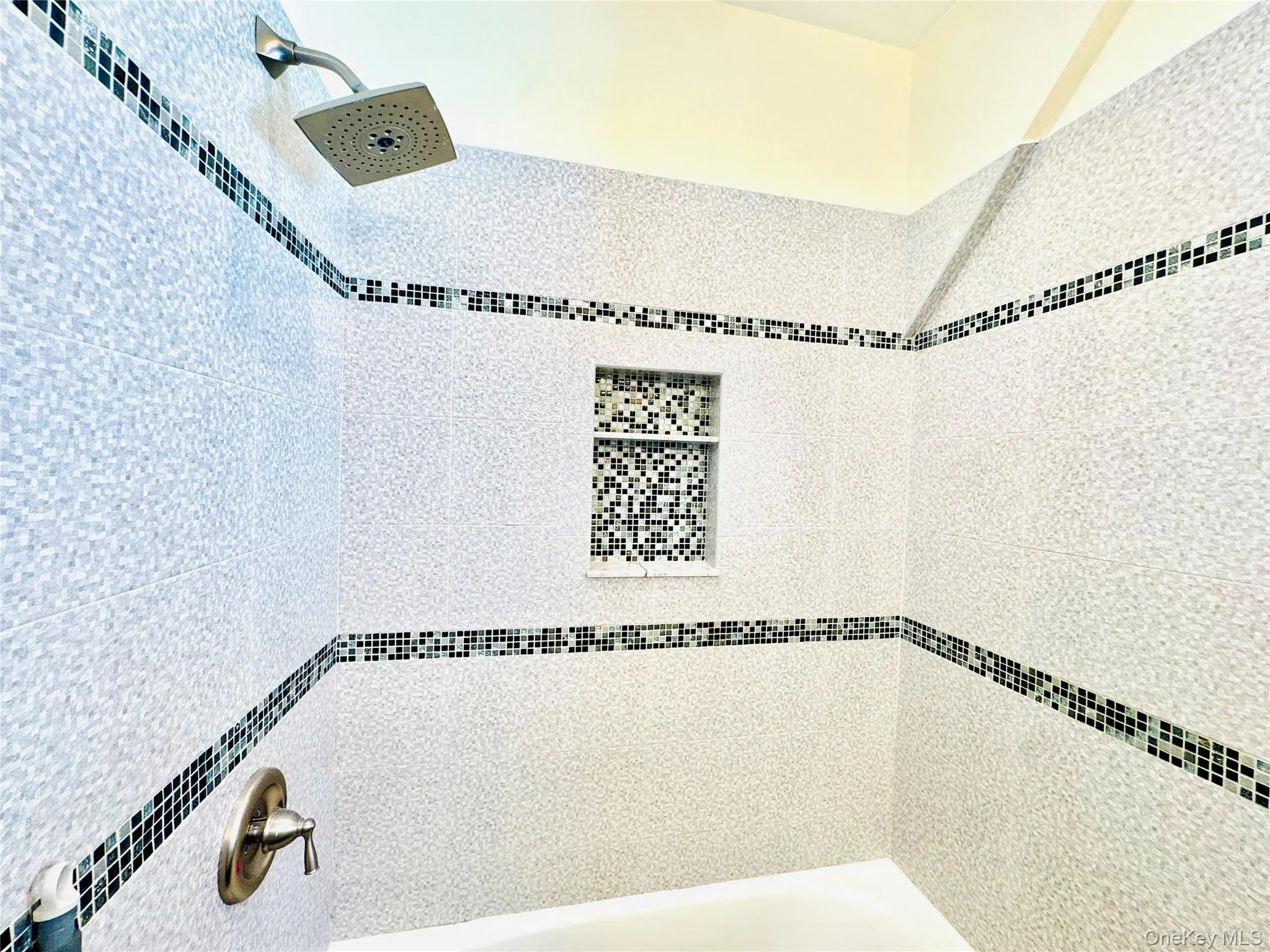 Full bathroom with tiled shower Full bathroom with tiled shower