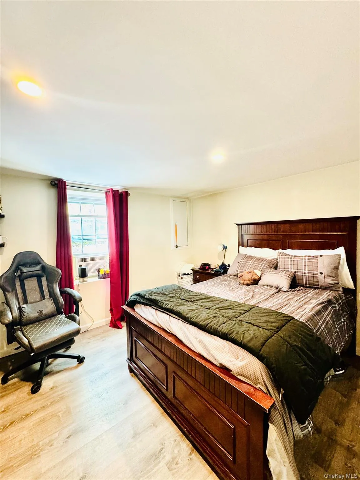 Bedroom with light wood-style floors Bedroom with light wood-style floors