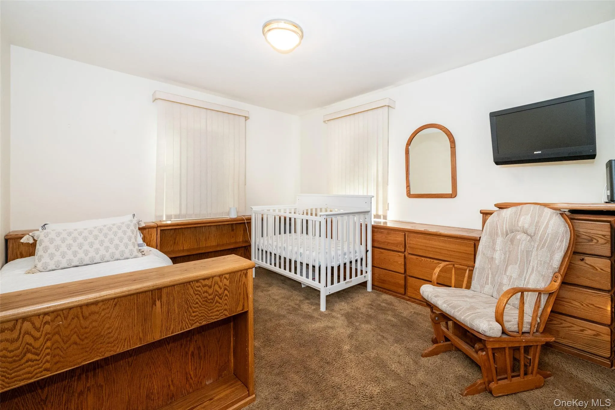 Bedroom with carpet floors Bedroom with carpet floors