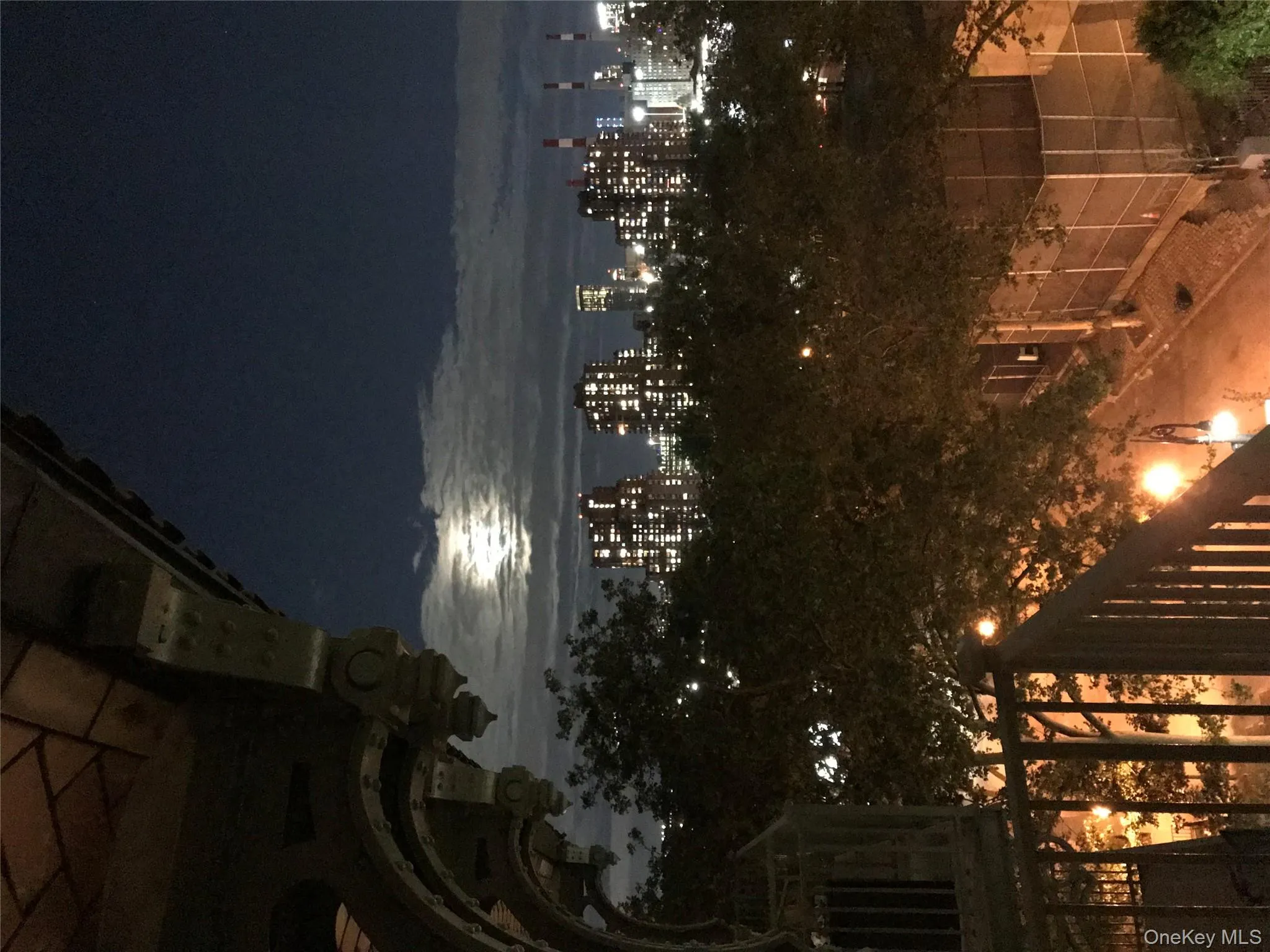 View of city featuring a view of city lights View of city featuring a view of city lights