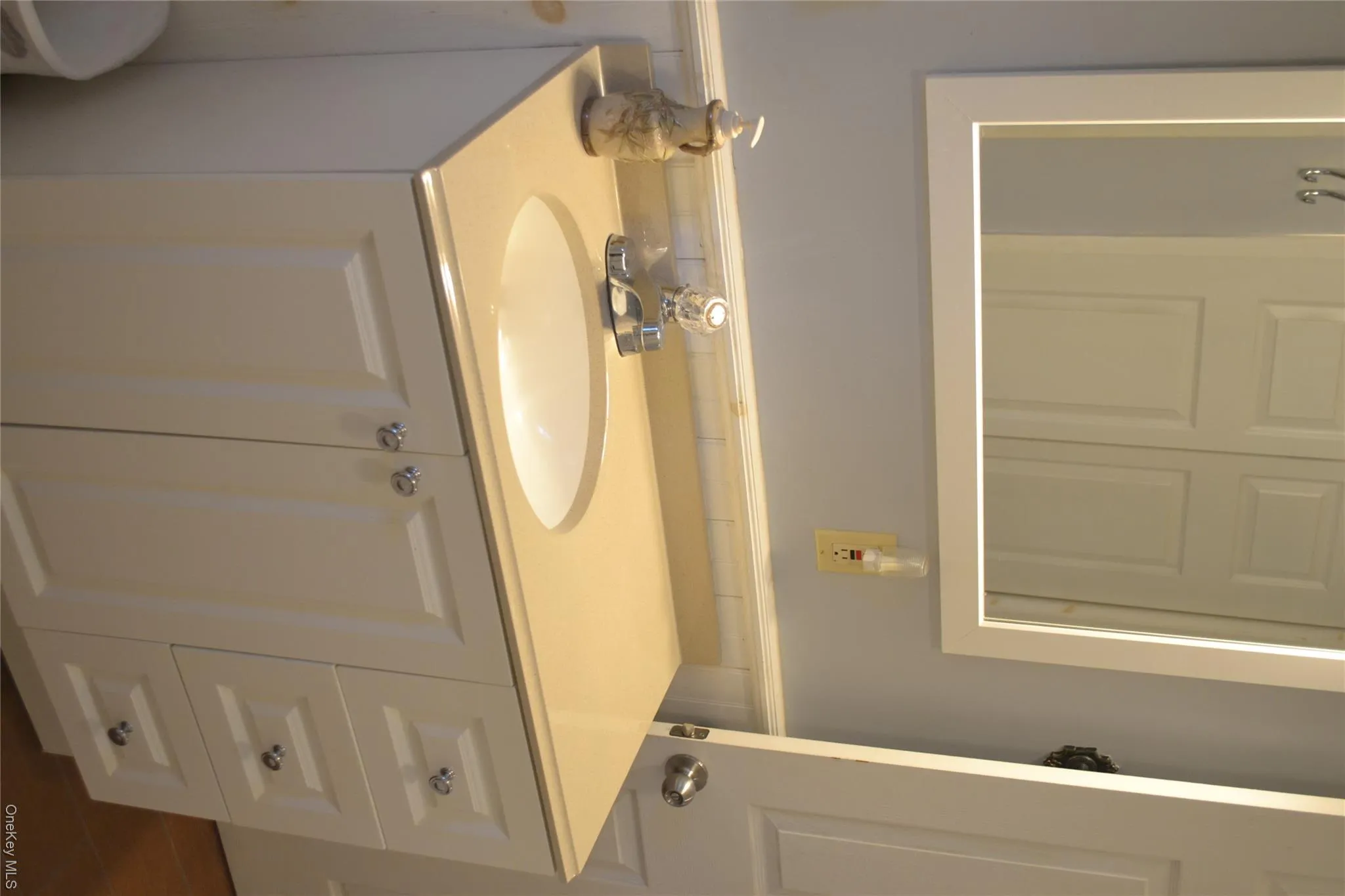 Bathroom featuring vanity Bathroom featuring vanity