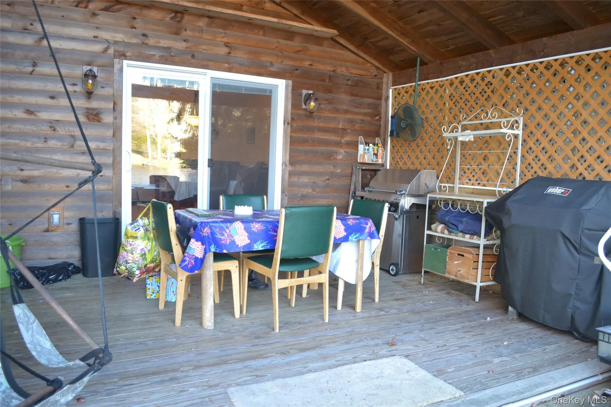 Deck with area for grilling and outdoor dining area Deck with area for grilling and outdoor dining area