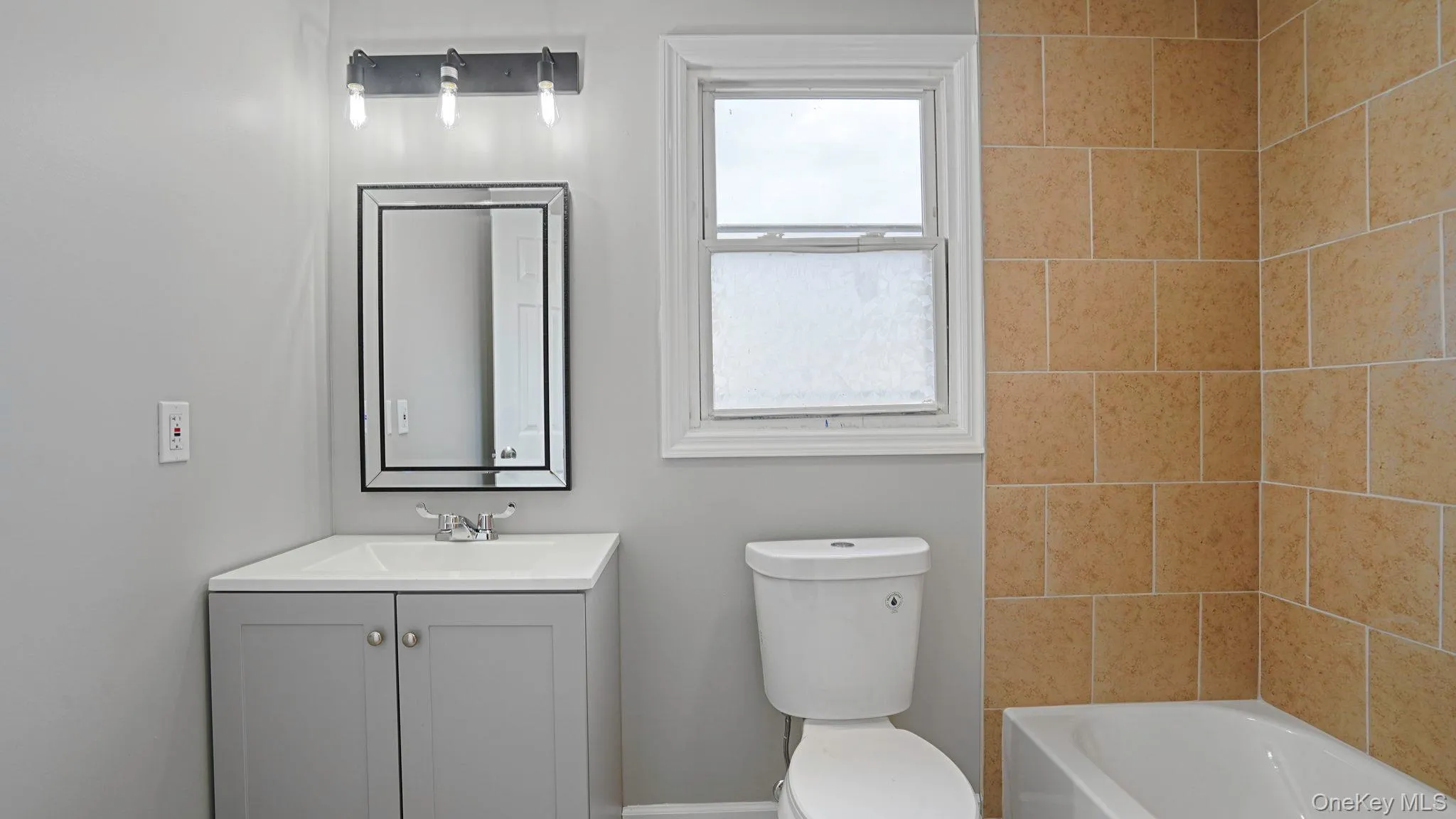 Full bathroom with vanity and  shower combination Full bathroom with vanity and  shower combination