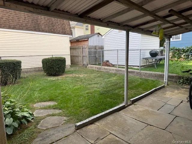 View of yard featuring a patio View of yard featuring a patio