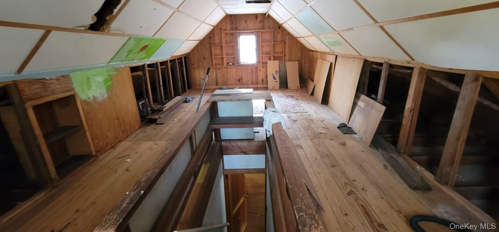 Unfinished attic with an upstairs landing Unfinished attic with an upstairs landing