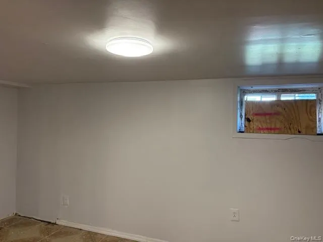 Empty room featuring baseboards Empty room featuring baseboards
