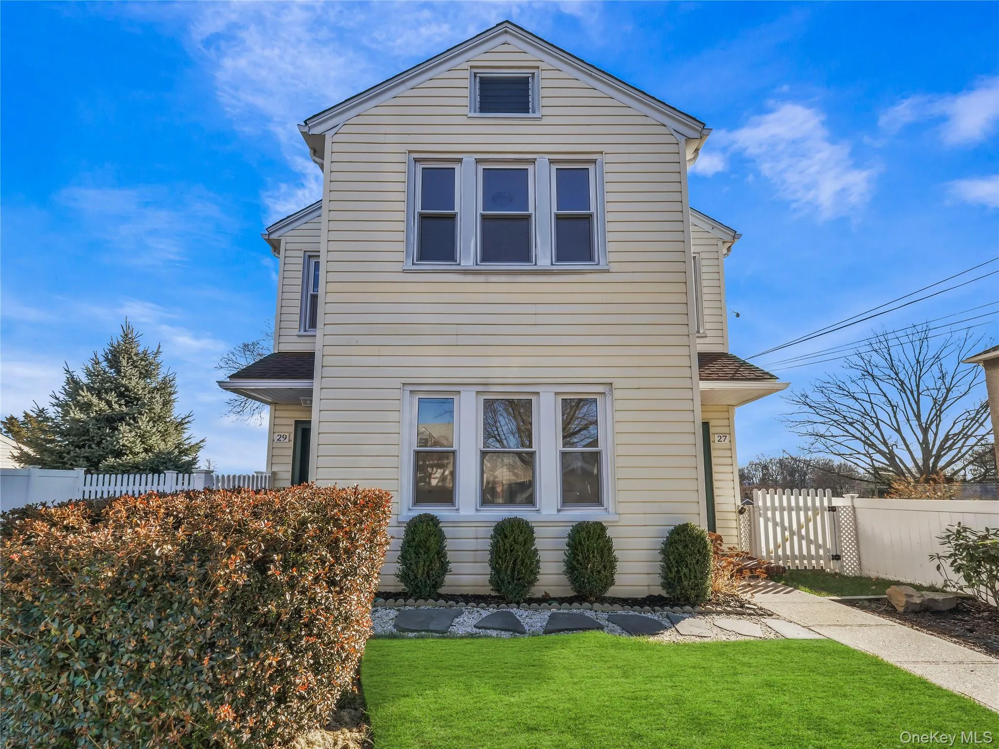 View of front of property with a front lawn View of front of property with a front lawn