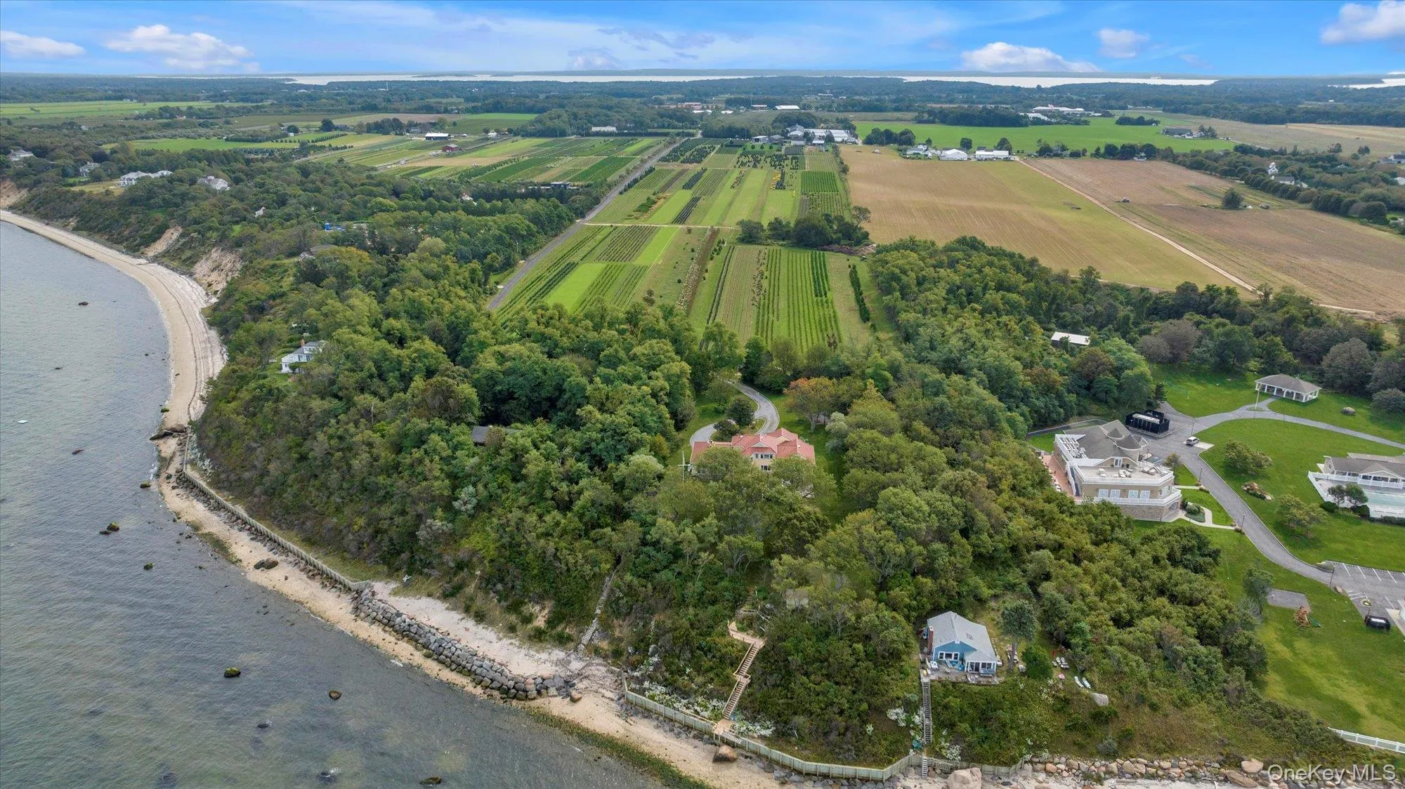 Aerial overview of property's location with rural landscape and farmland Aerial overview of property's location with rural landscape and farmland
