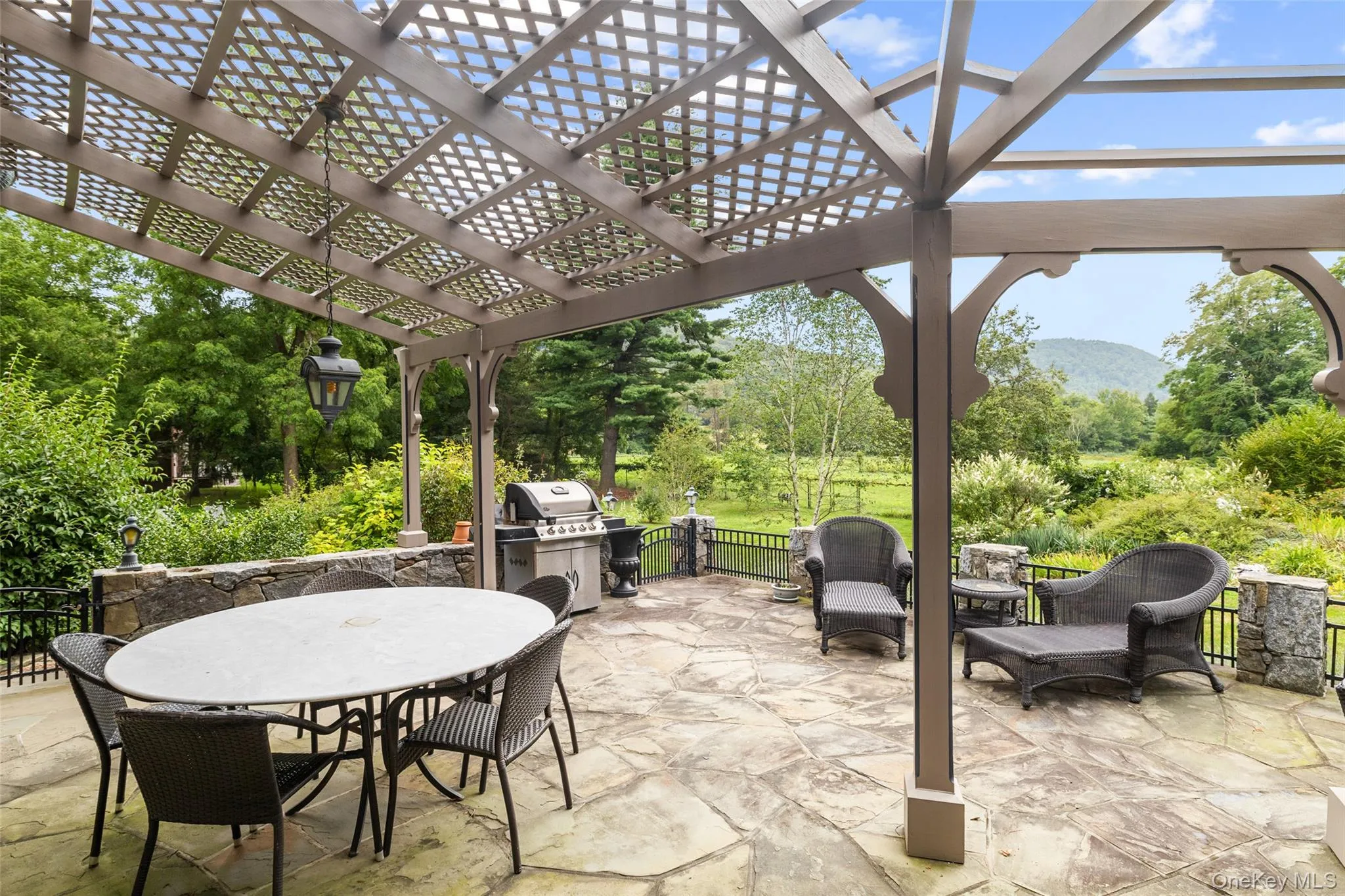 View of stone patio with outdoor dining space View of stone patio with outdoor dining space