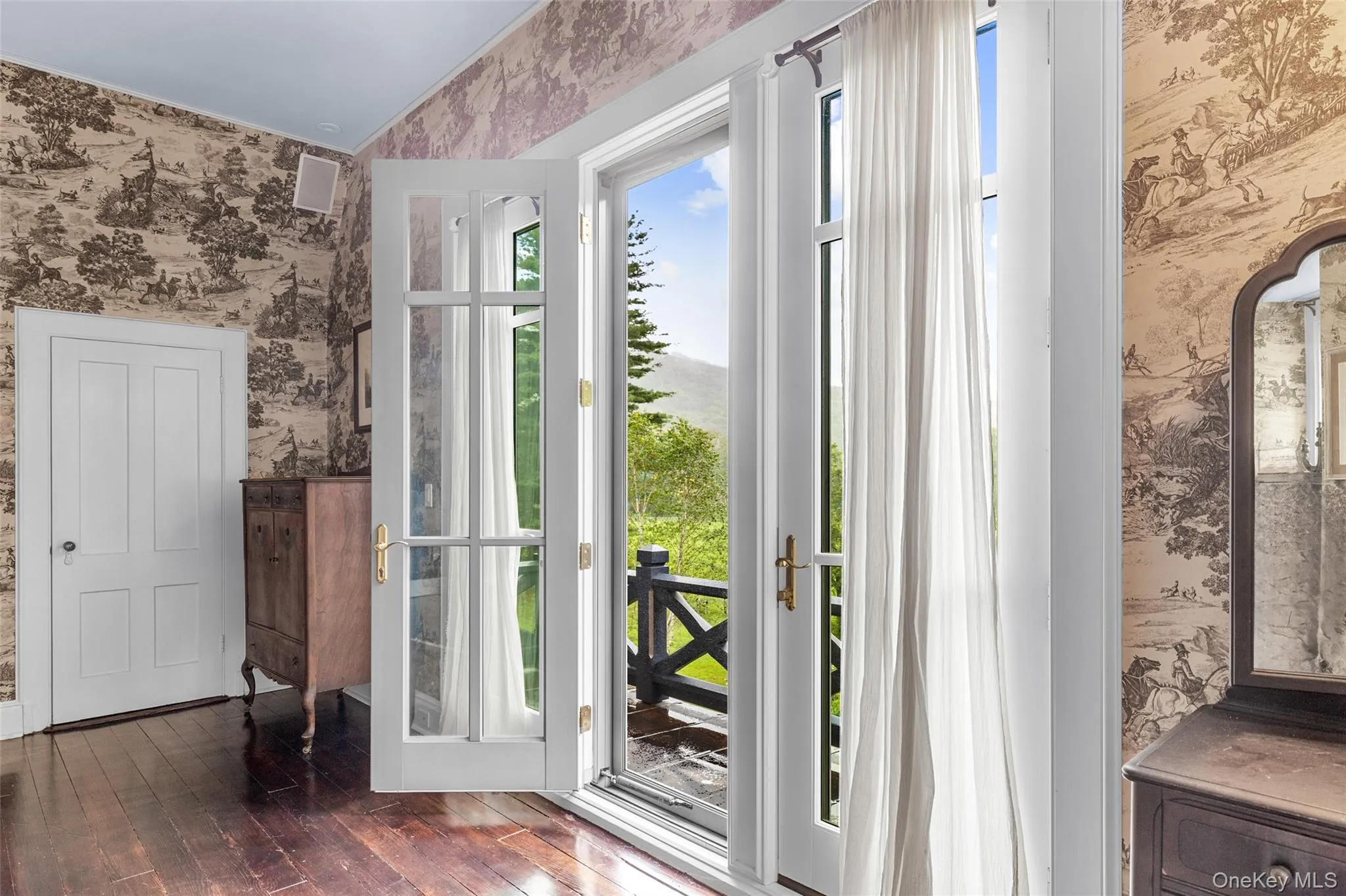 Enjoy views of rolling hills from the balcony in the primary suite Enjoy views of rolling hills from the balcony in the primary suite