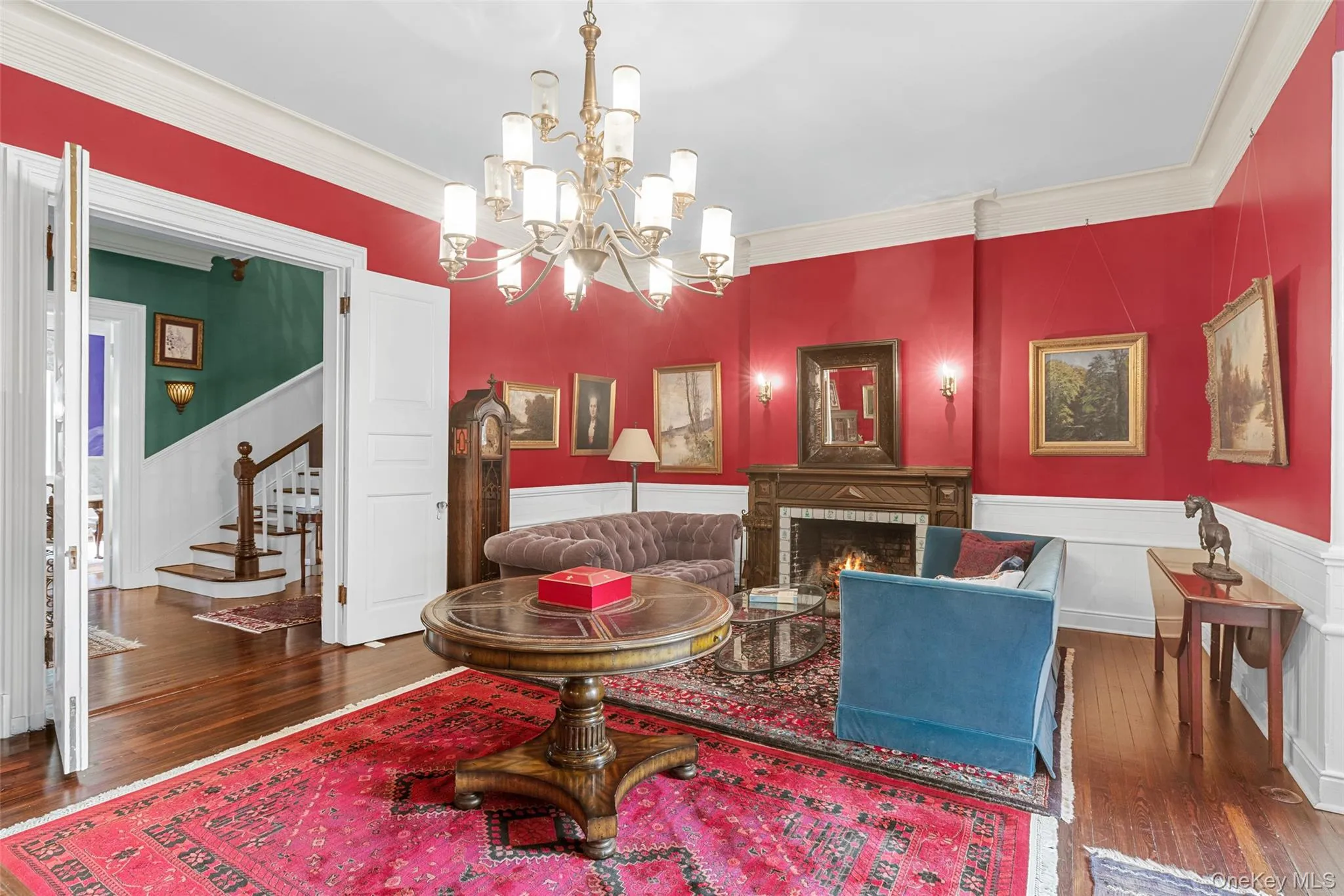 Office/parlor featuring soaring 12 foot ceilings and fireplace Office/parlor featuring soaring 12 foot ceilings and fireplace