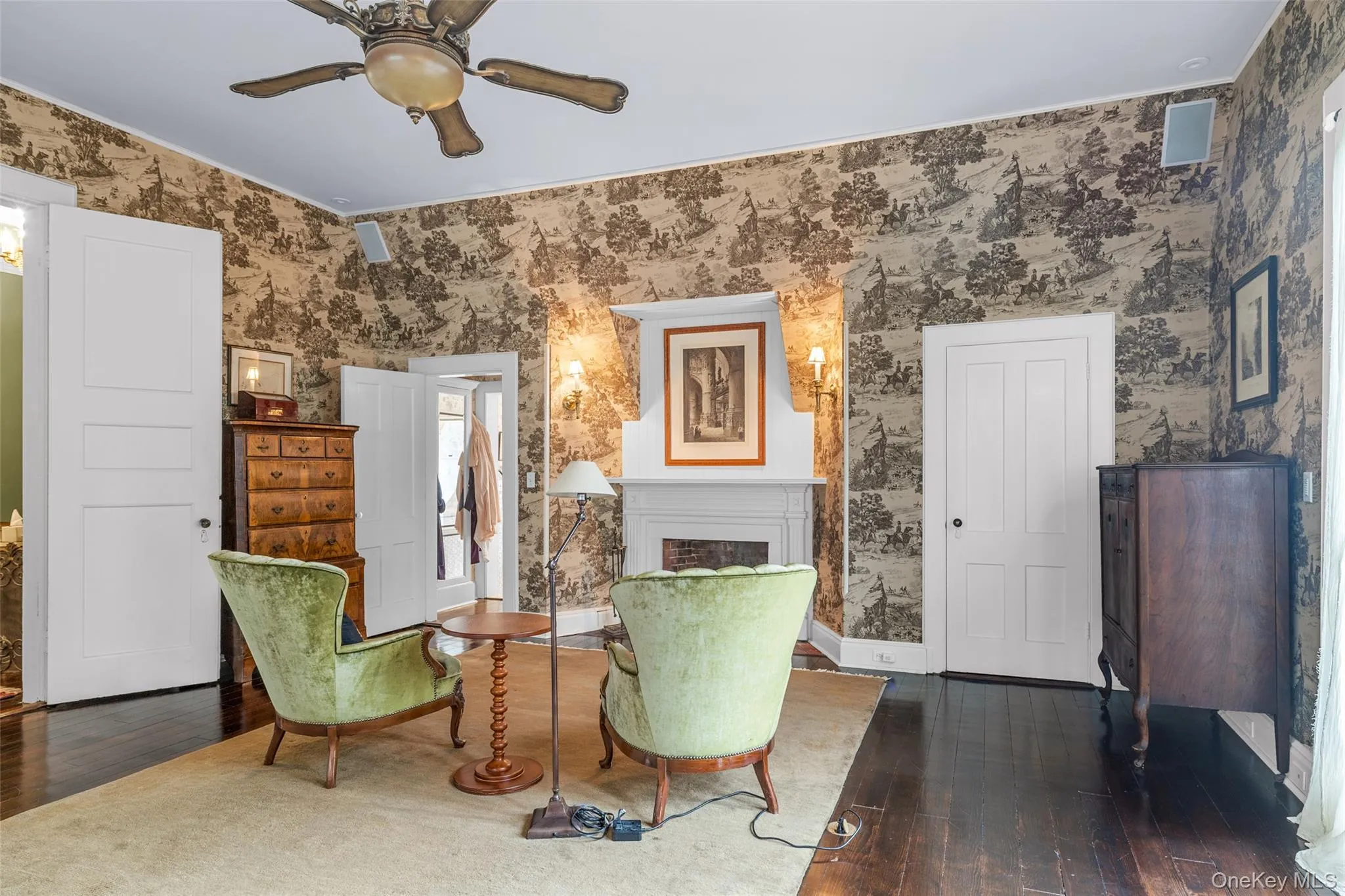 Spacious primary bedroom with fireplace Spacious primary bedroom with fireplace