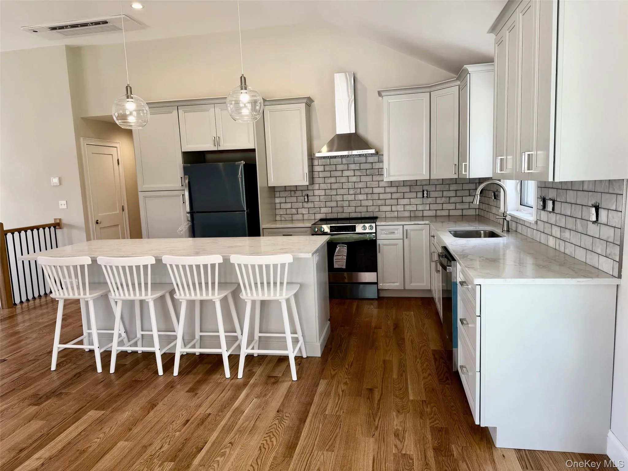 Hardwood floors throughout. Top quality cabinetry, backsplash Hardwood floors throughout. Top quality cabinetry, backsplash