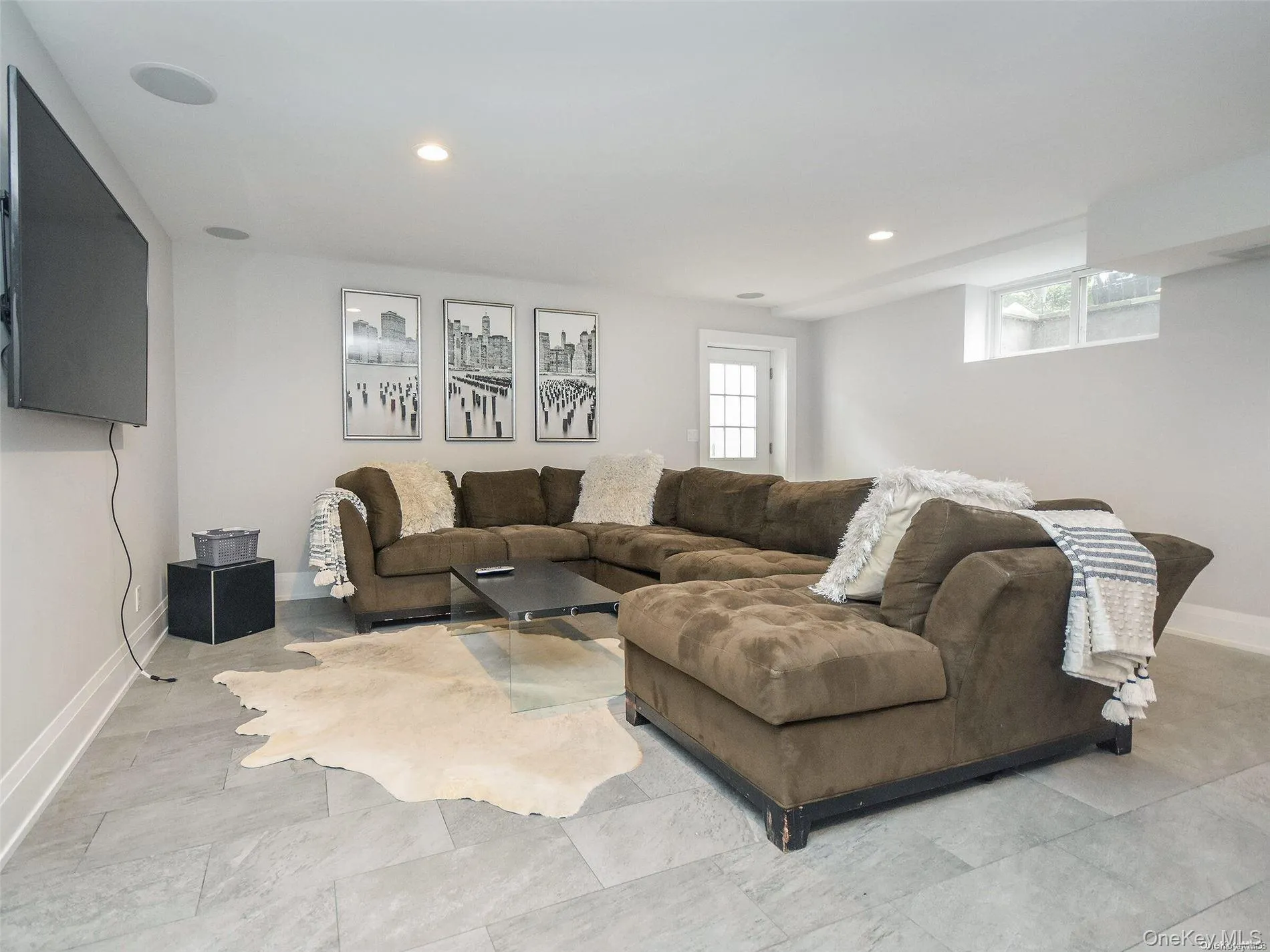 Living room with recessed lighting and baseboards Living room with recessed lighting and baseboards