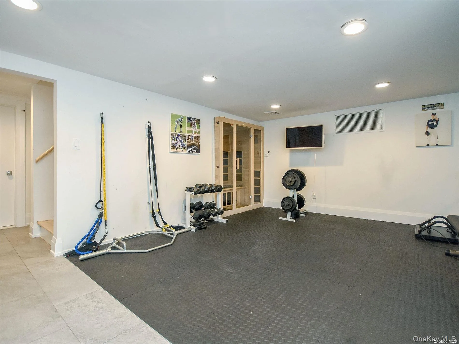 Workout room featuring recessed lighting Workout room featuring recessed lighting