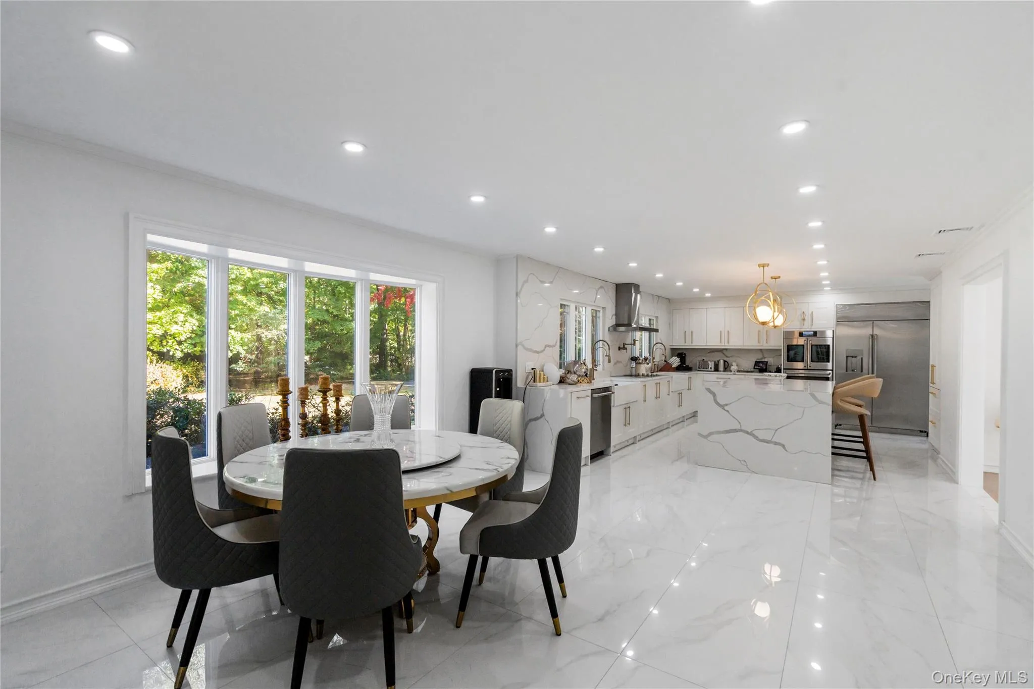 Waterfall center island with sleek finishes Waterfall center island with sleek finishes