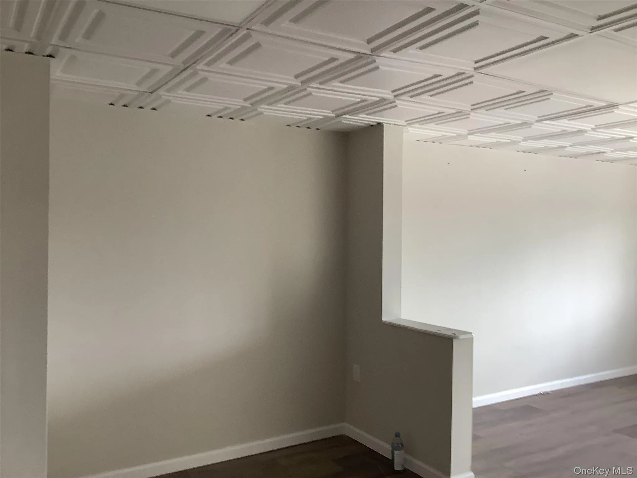 Walk in closet with dark wood-type flooring Walk in closet with dark wood-type flooring