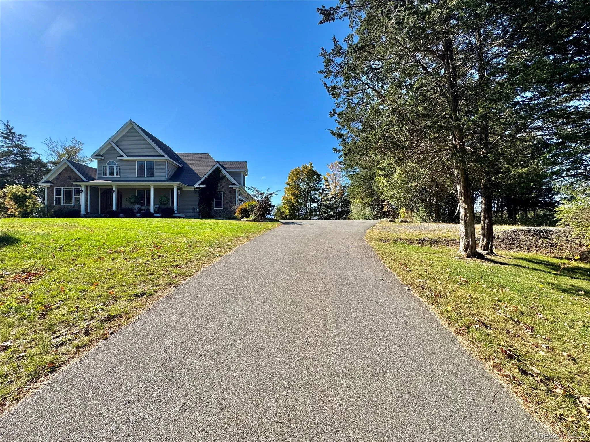 View of asphalt driveway View of asphalt driveway