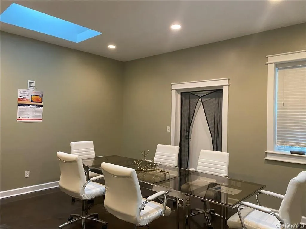 Dining area featuring recessed lighting and a skylight Dining area featuring recessed lighting and a skylight