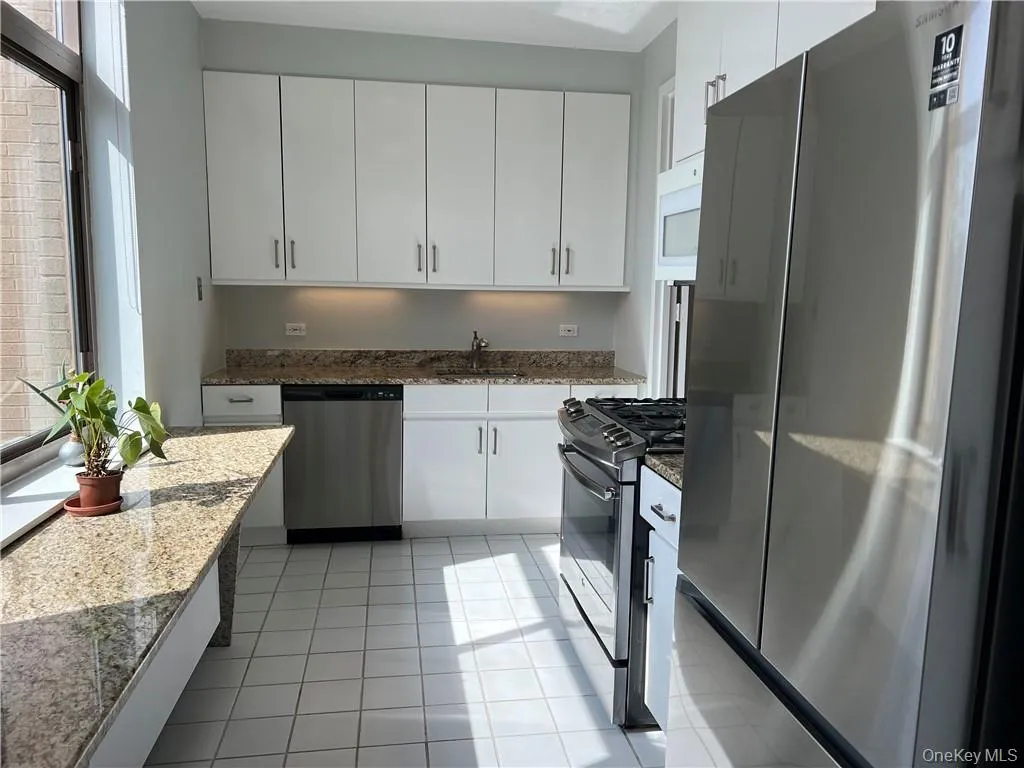 View From Dining Room Towards Kitchen - Lots of Cabinetry for Storage and Granite Countertops View From Dining Room Towards Kitchen - Lots of Cabinetry for Storage and Granite Countertops