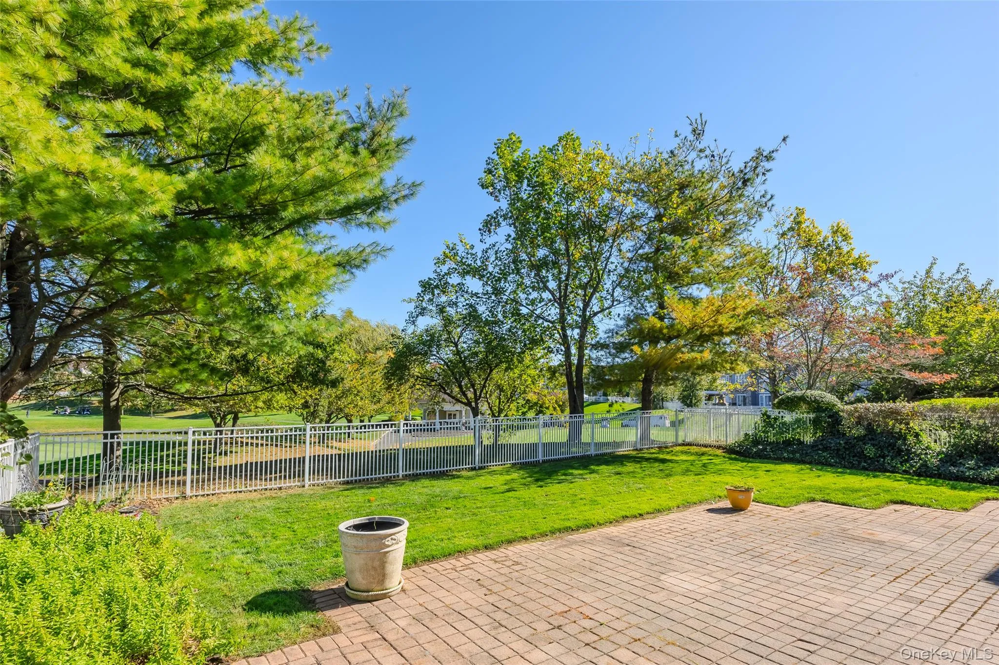 Fenced backyard featuring a patio area Fenced backyard featuring a patio area