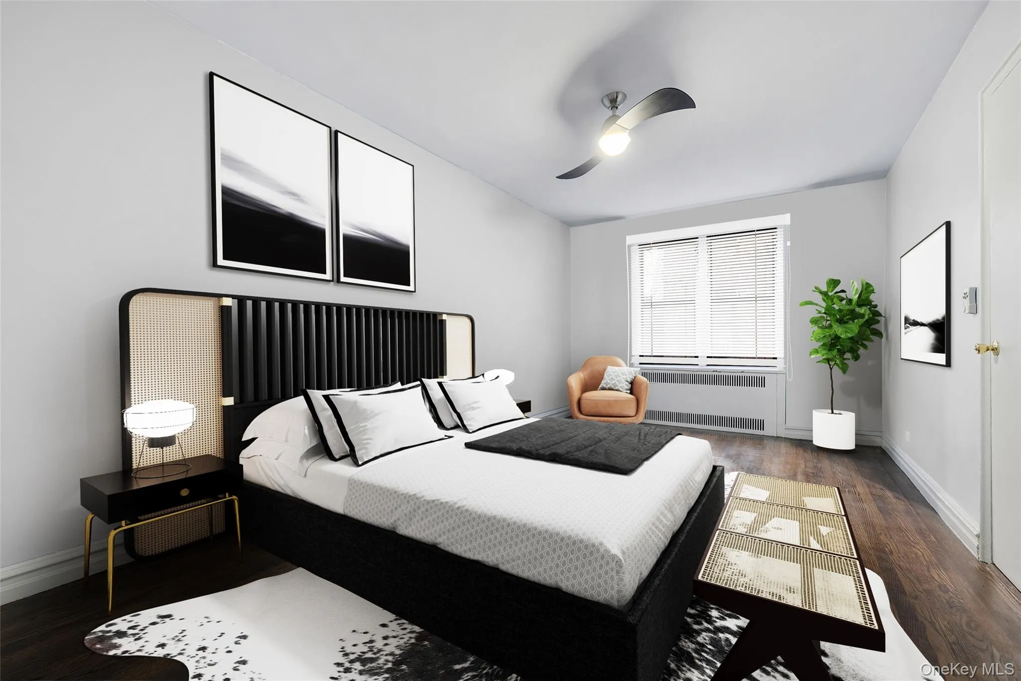 Bedroom with dark wood finished floors, radiator heating unit, and ceiling fan Bedroom with dark wood finished floors, radiator heating unit, and ceiling fan