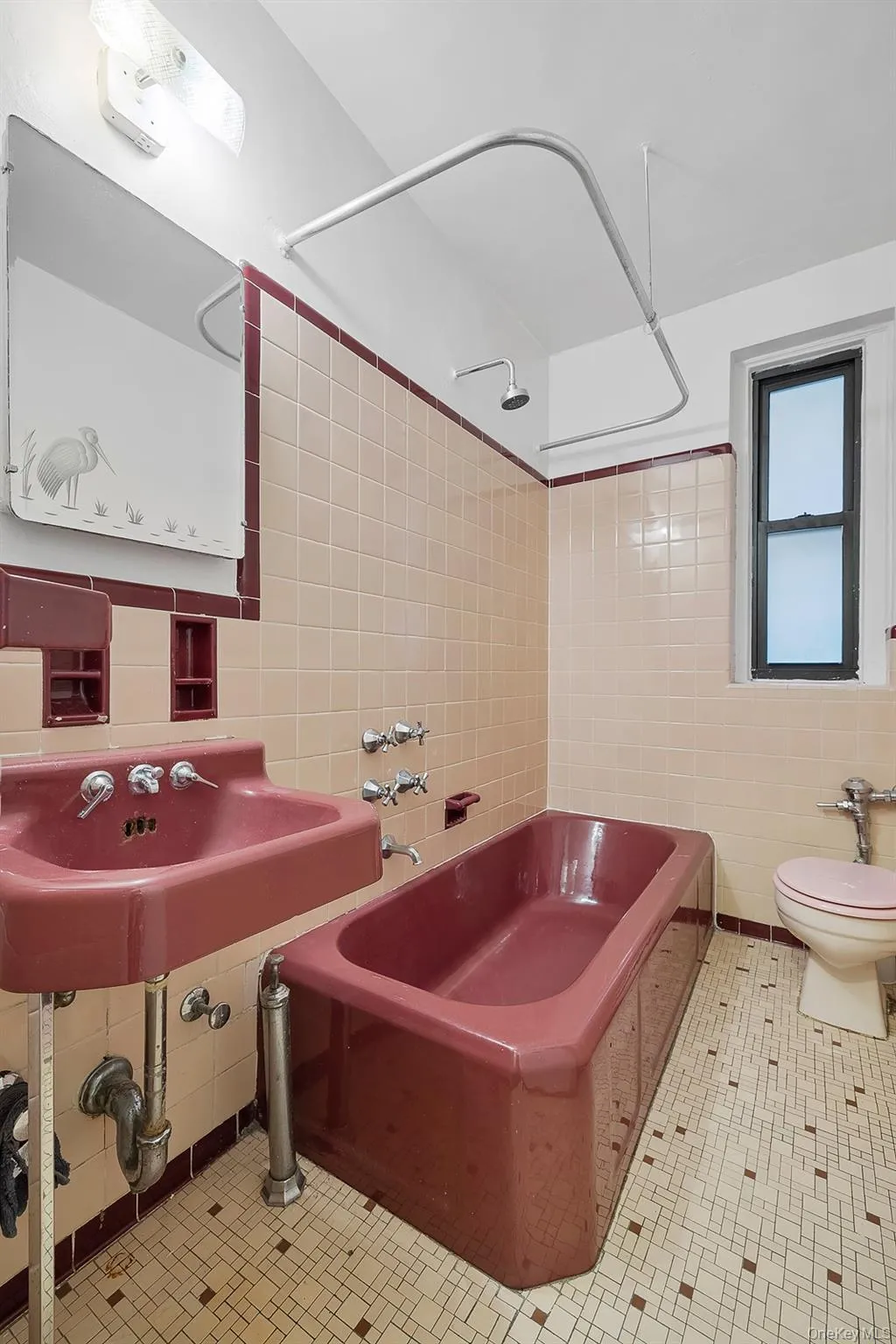 Full bath with tile walls, shower / bathtub combination, and light tile patterned floors Full bath with tile walls, shower / bathtub combination, and light tile patterned floors