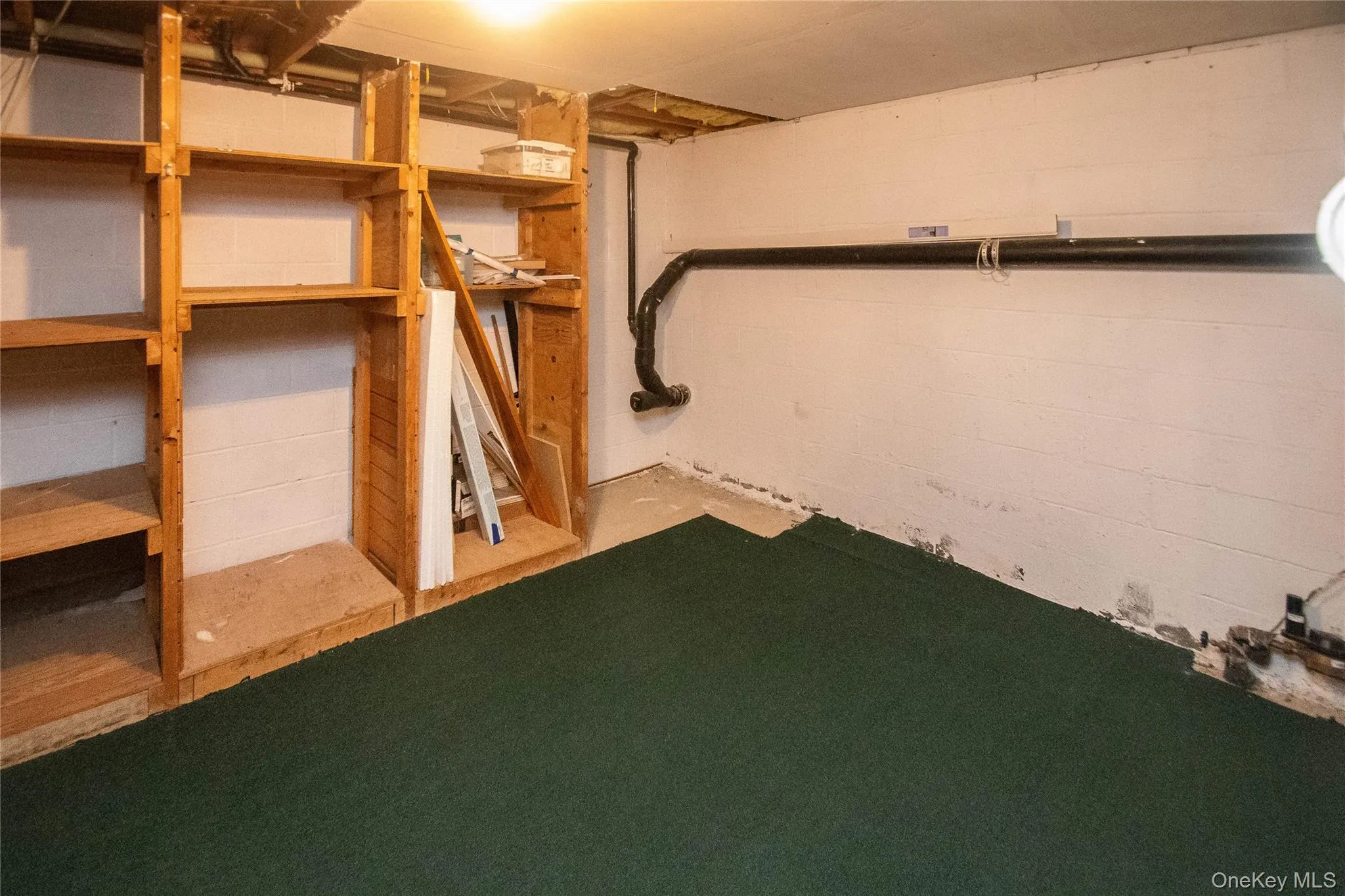 View of unfinished below grade area View of unfinished below grade area