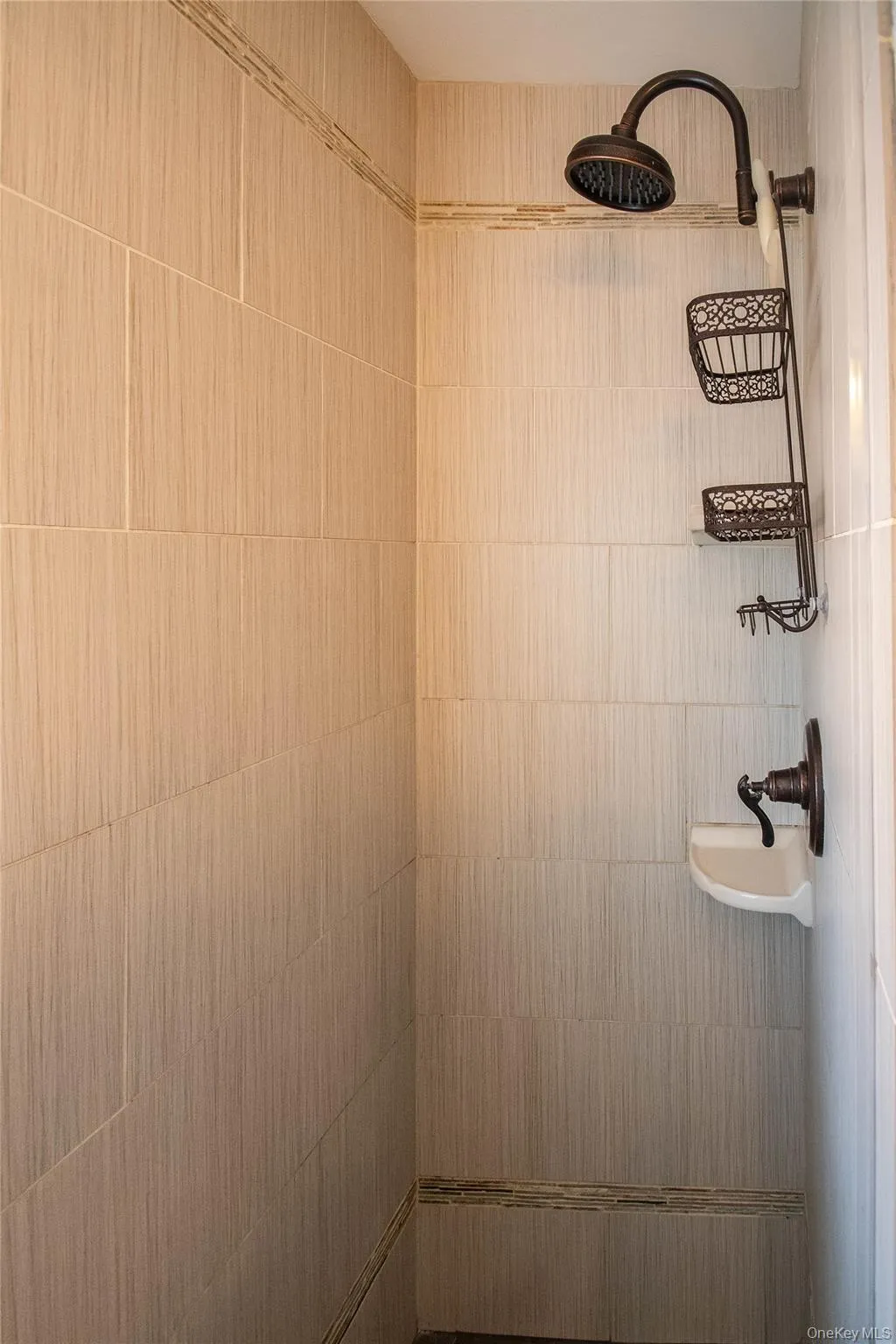 Bathroom view of a tile shower Bathroom view of a tile shower