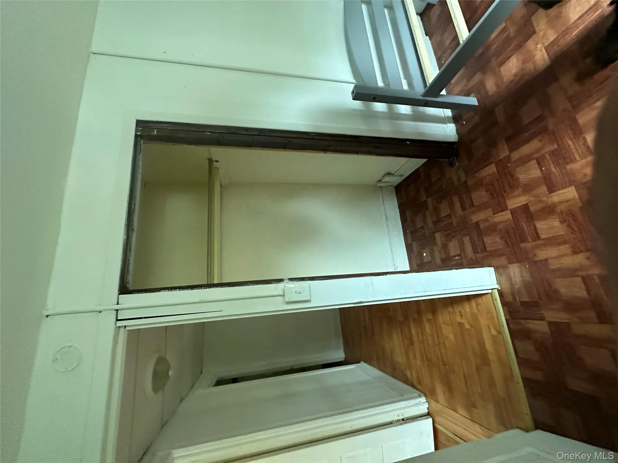 Unfurnished bedroom with a closet Unfurnished bedroom with a closet