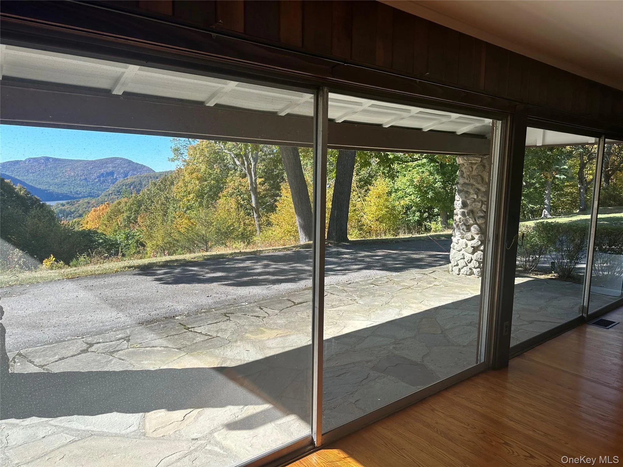 Doorway featuring wood finished floors and a mountain view Doorway featuring wood finished floors and a mountain view