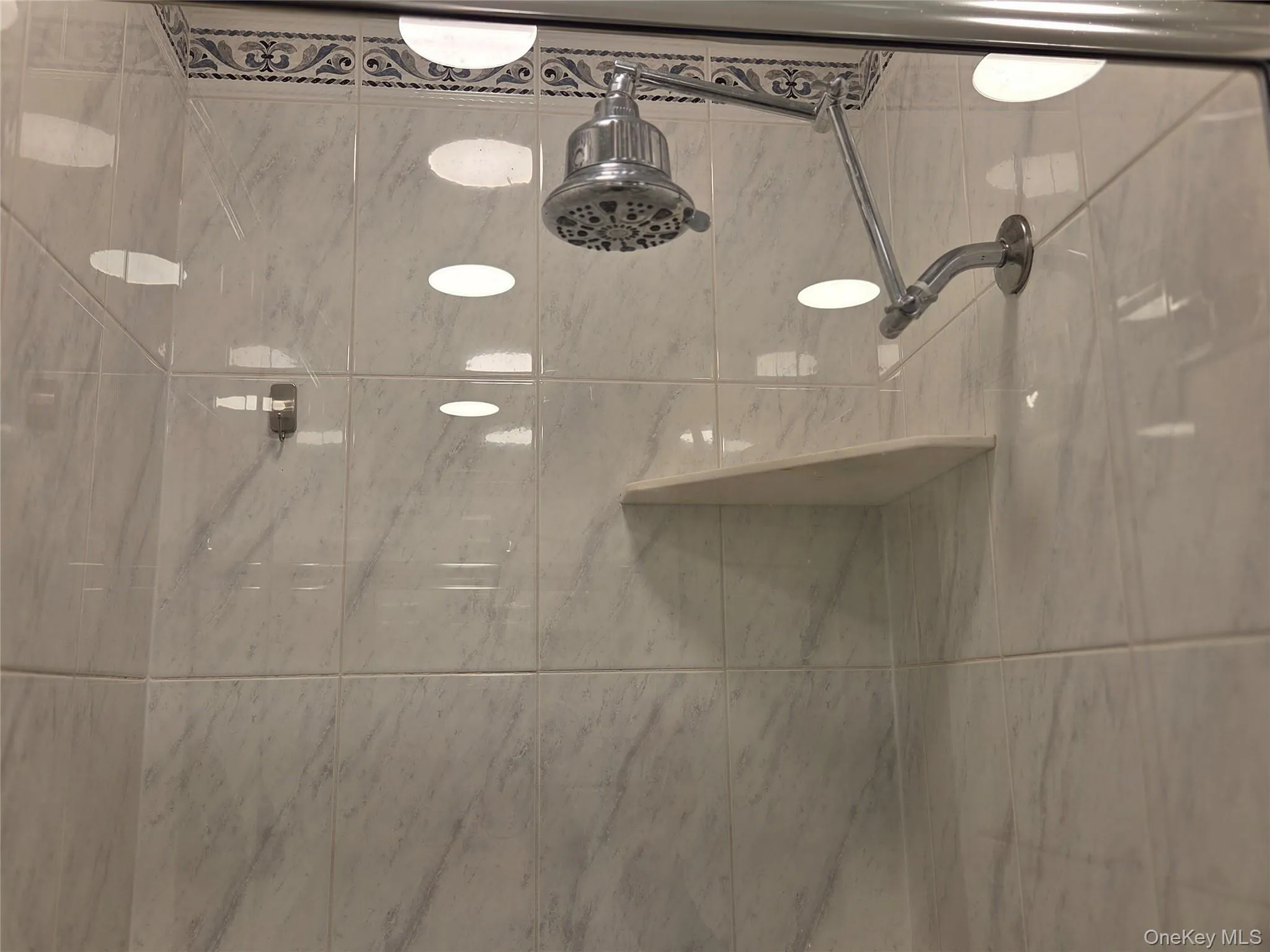 Bathroom view of a shower stall Bathroom view of a shower stall