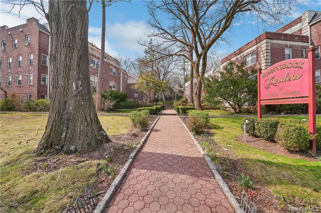 View of community featuring a lawn View of community featuring a lawn