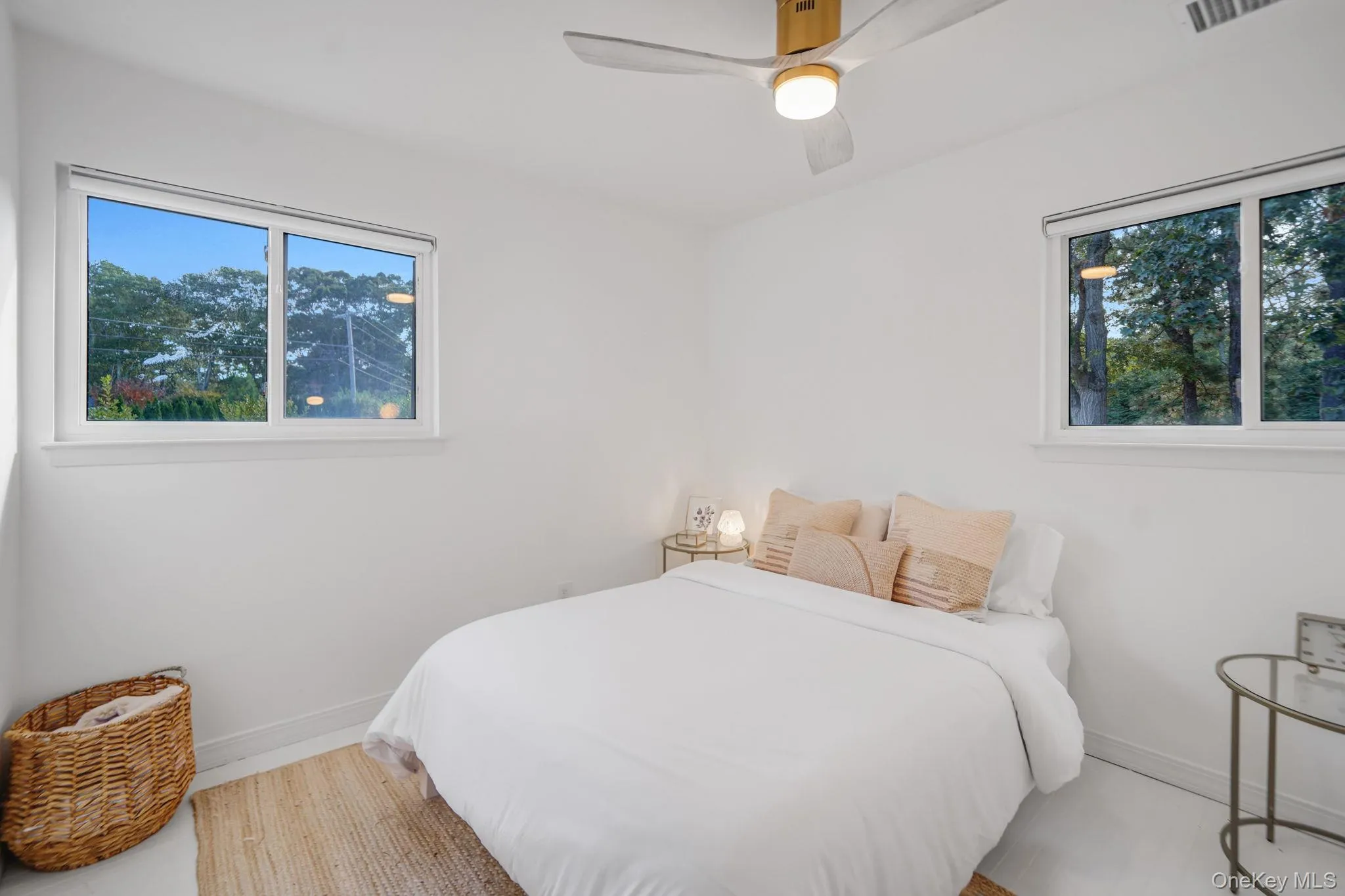 Bedroom with baseboards and ceiling fan Bedroom with baseboards and ceiling fan