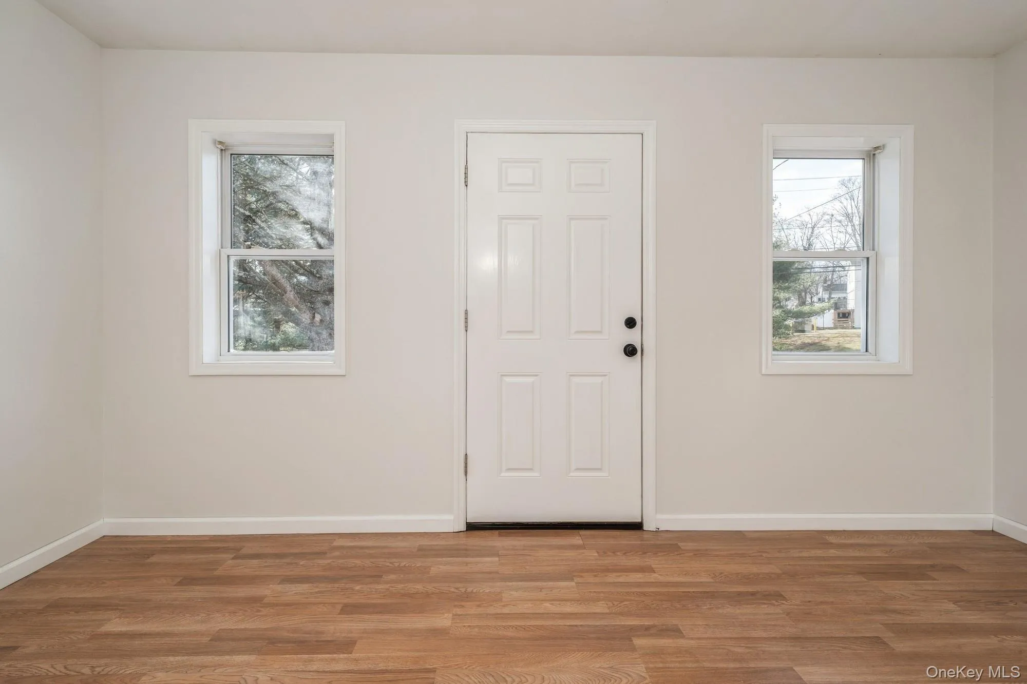 Foyer with wood finished floors Foyer with wood finished floors
