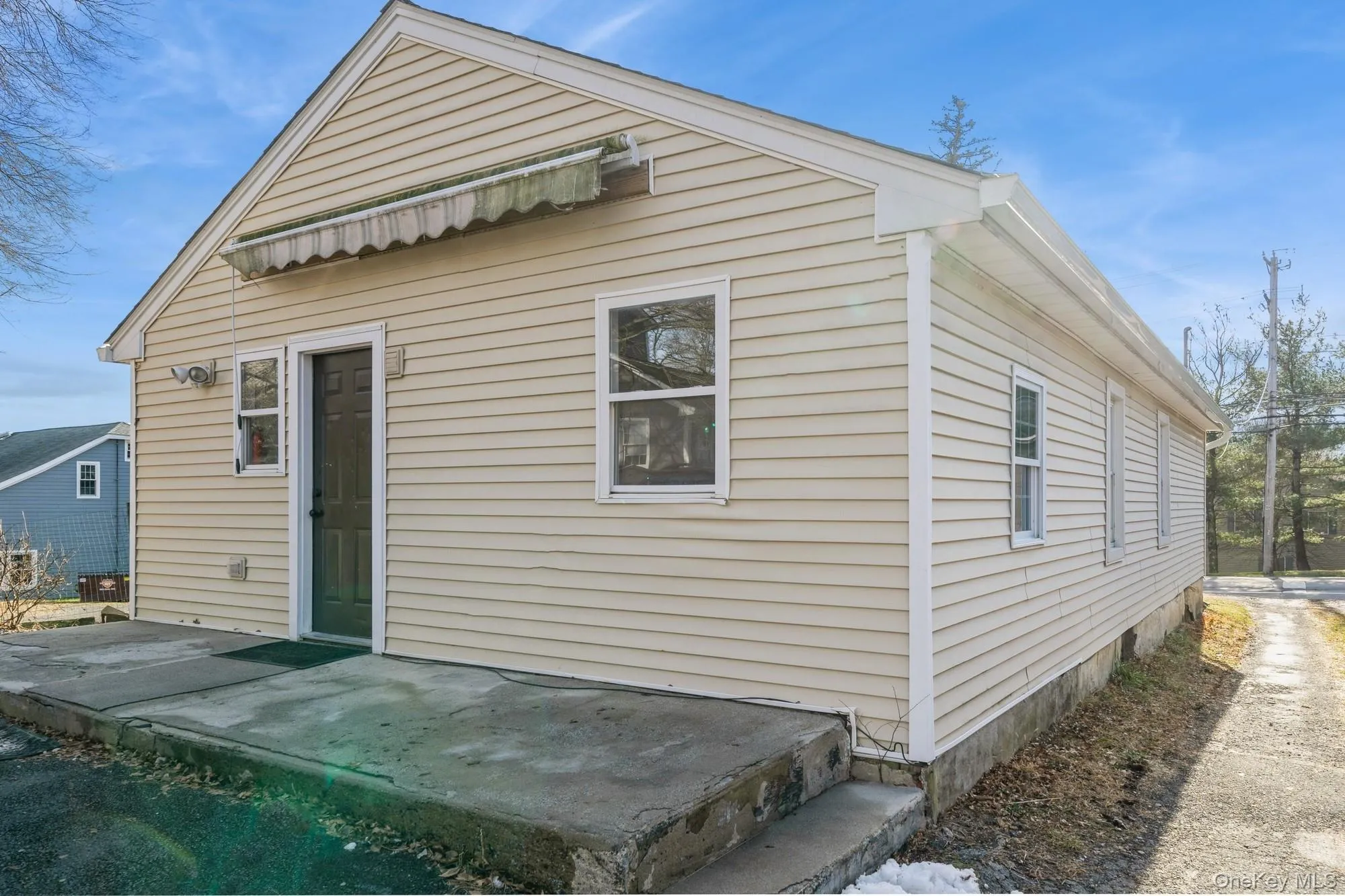 Back of property featuring a patio Back of property featuring a patio